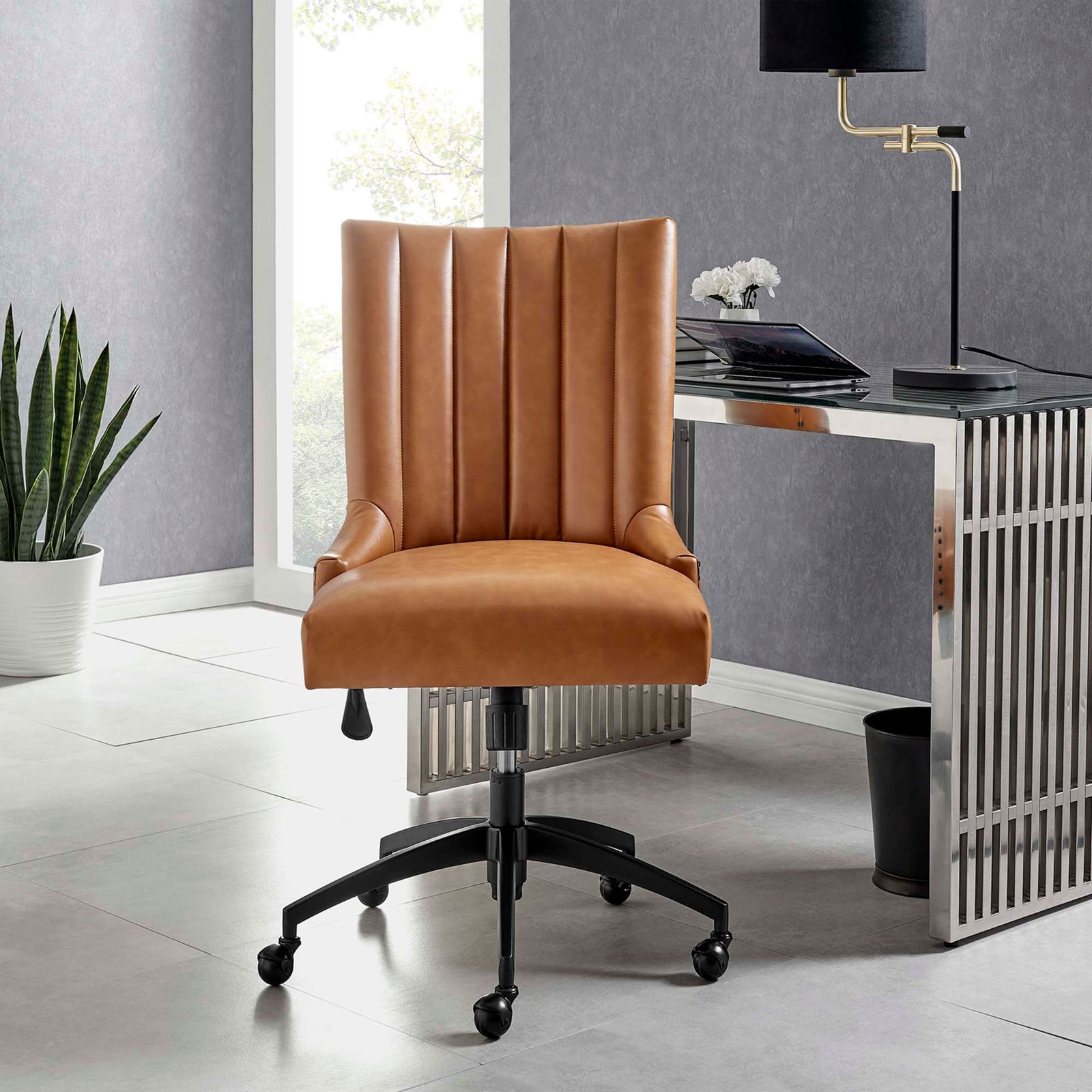 Tan vegan leather office chair centered at desk, emphasizing channel-tufted back and deep seat cushion || EEI-4577-BLK-TAN || front_room