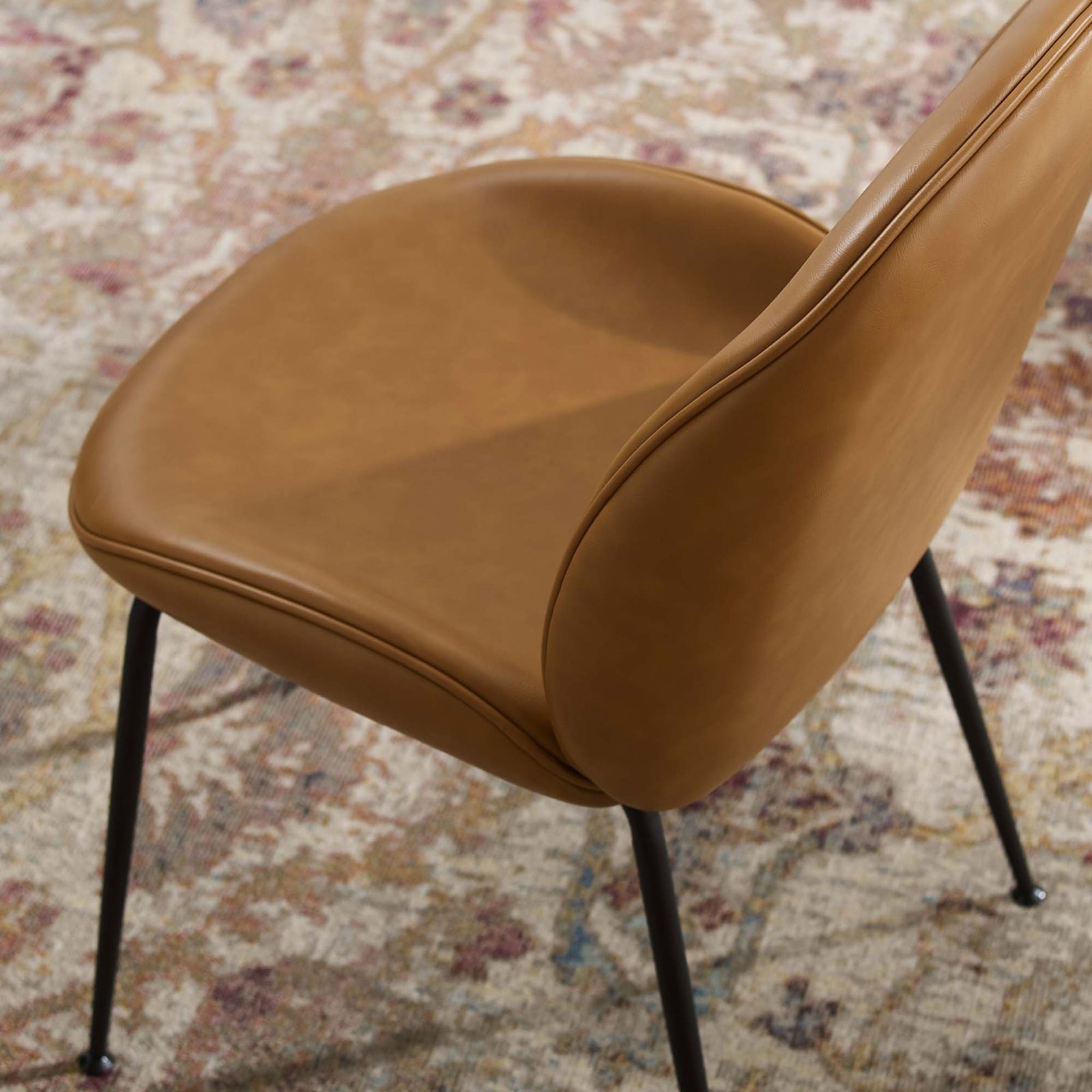 Tan vegan leather Scoop dining chair seat showcasing smooth upholstery and tailored piping || EEI-4636-TAN || detail_room