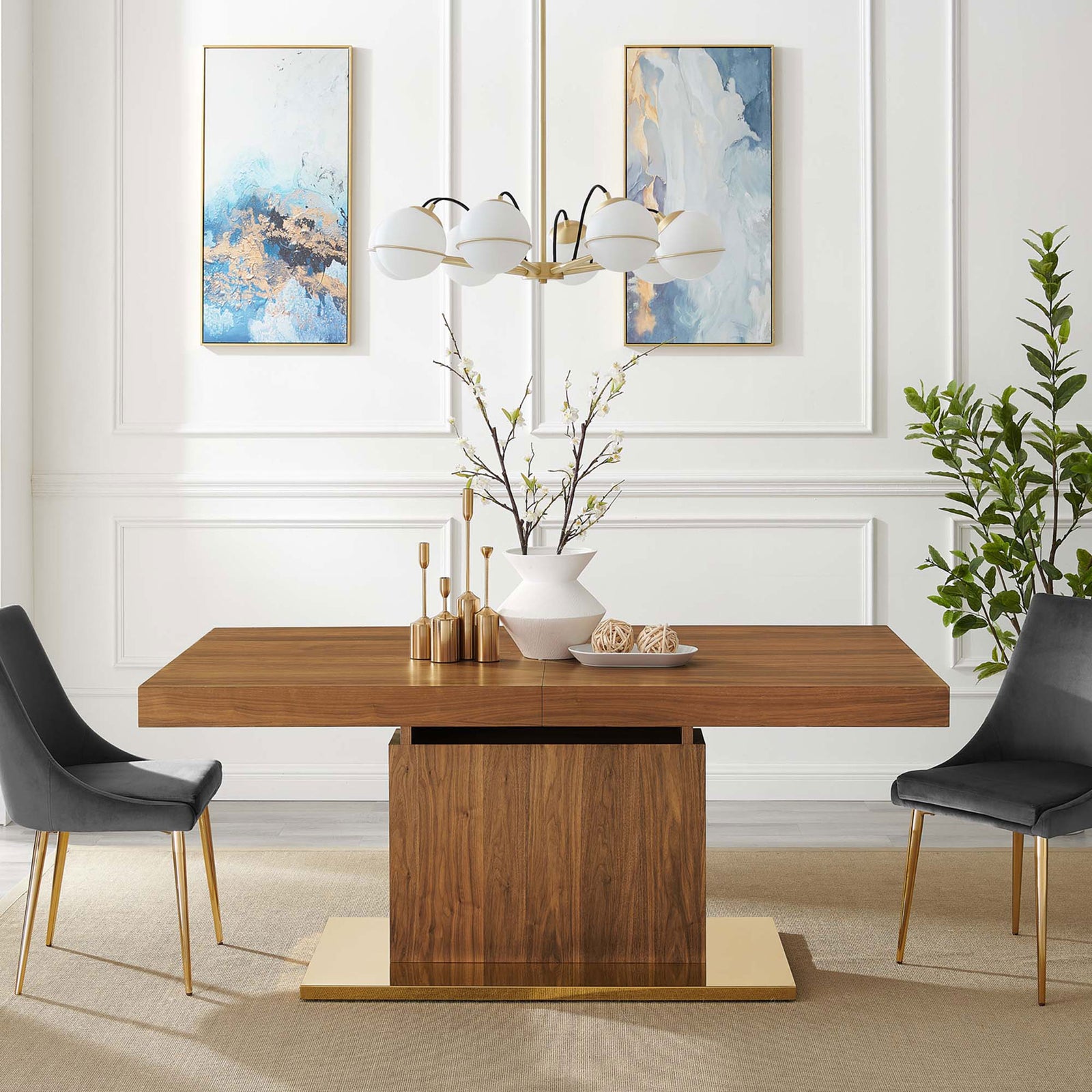 Vector dining table in a contemporary dining room paired with upholstered chairs and decor || EEI-4660-WAL-GLD || front_room