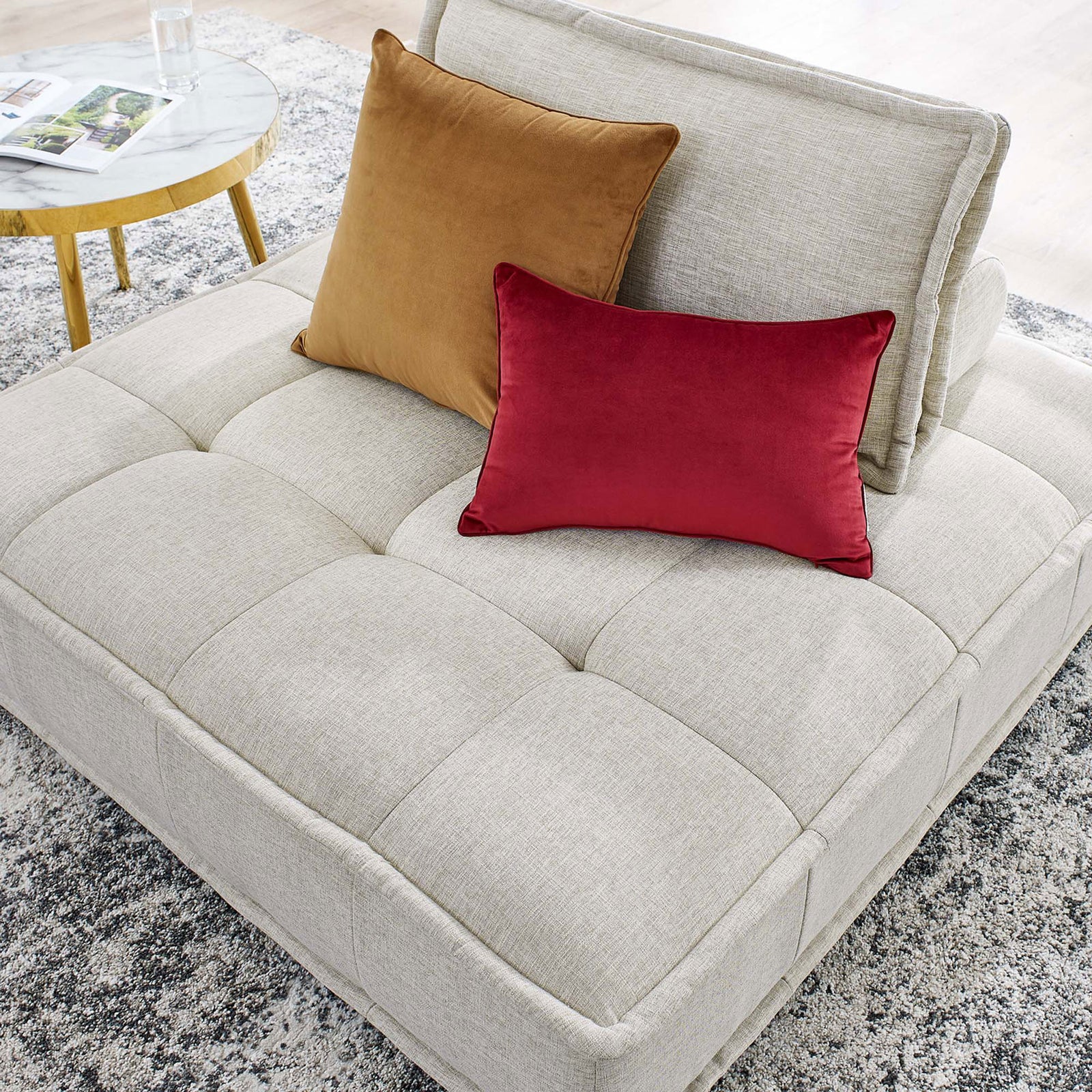 Biscuit-tufted seat in versatile beige adds plush texture and modern comfort to any space. || EEI-4725-BEI || detail_room