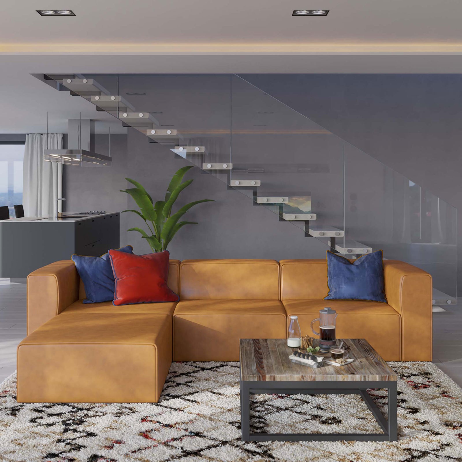 Tan vegan leather sectional and ottoman styled with colorful pillows, rug, and coffee table in a contemporary loft || EEI-4790-TAN || front_angle_room