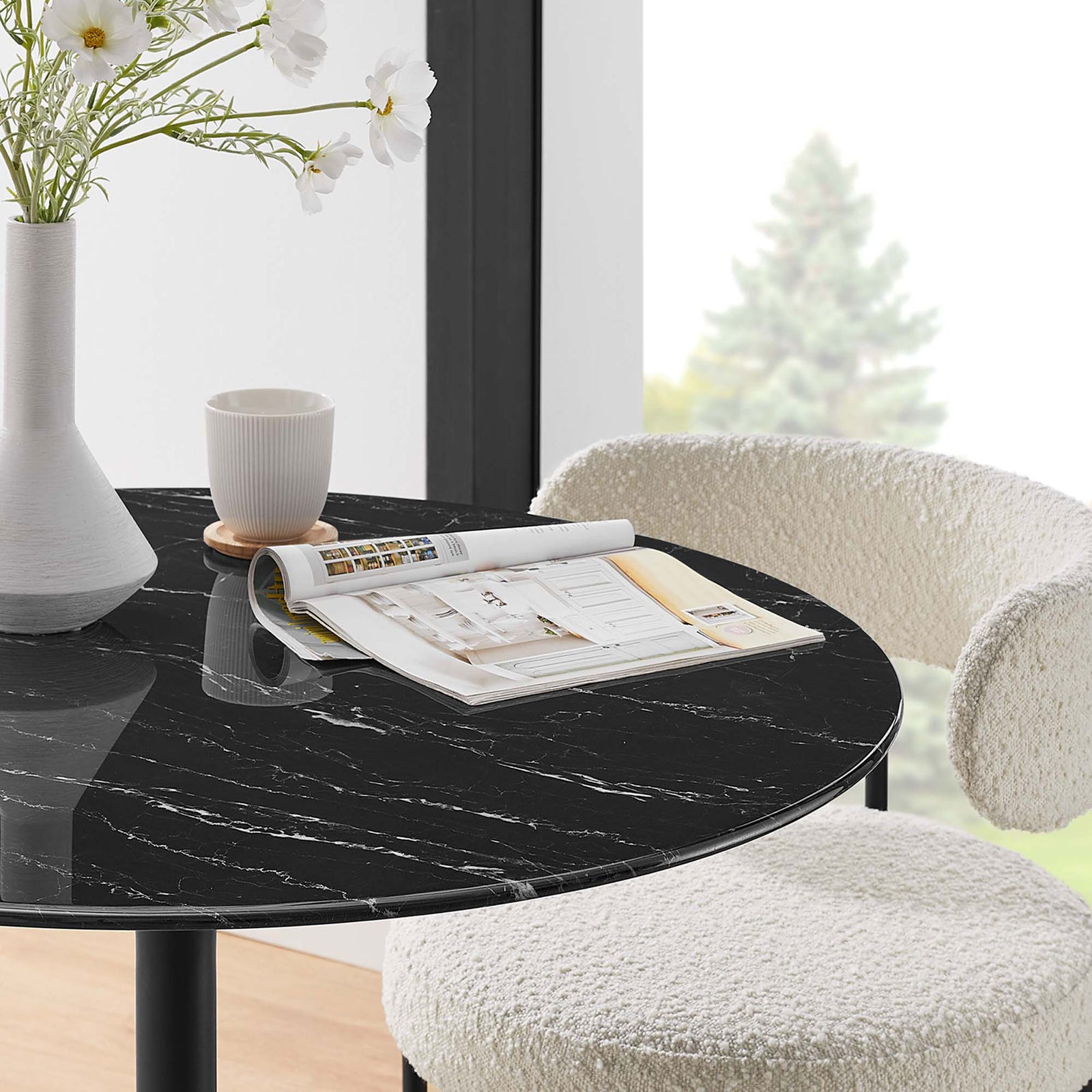 Tabletop vignette with black faux marble surface styled with flowers, coffee cup, and magazine. || EEI-4868-BLK-BLK || detail_room