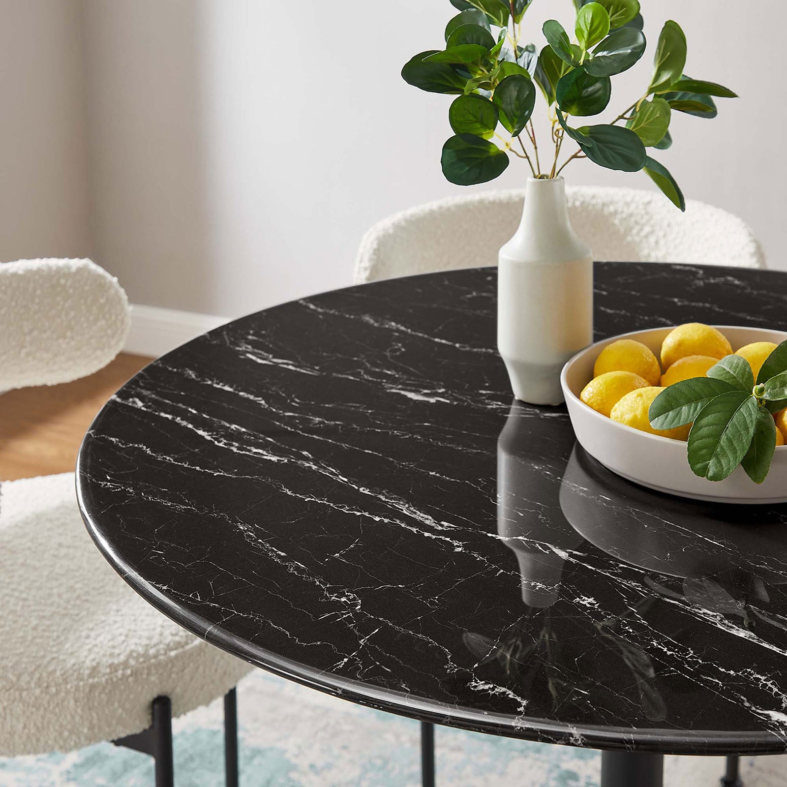 Black faux marble tabletop styled with vase, greenery, and bright citrus centerpiece. || EEI-4876-BLK-BLK || detail_room