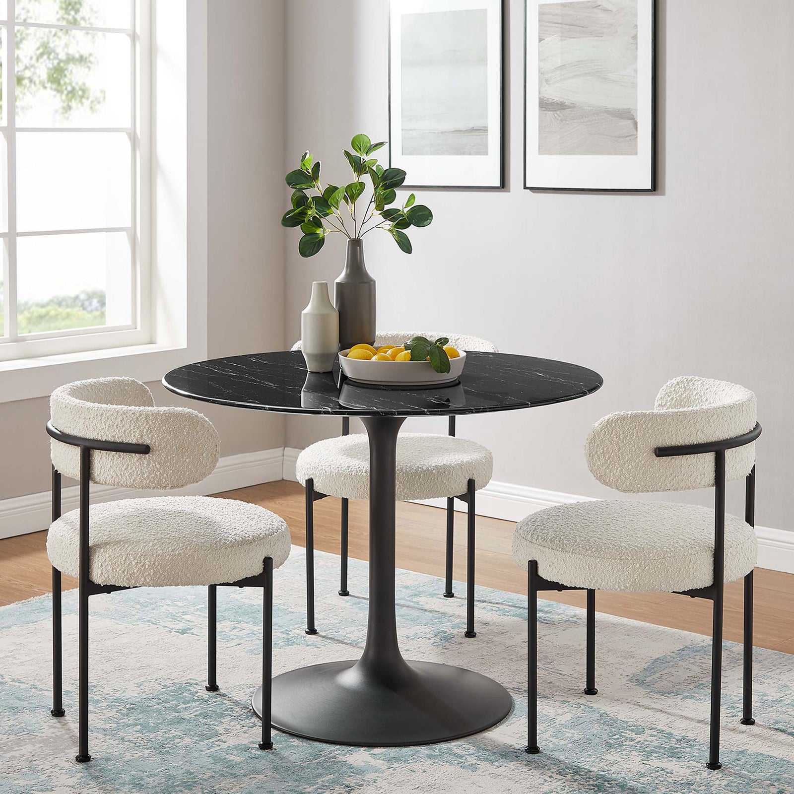 40 inch faux marble dining table creating a modern gathering spot with three boucle chairs. || EEI-4876-BLK-BLK || front_room