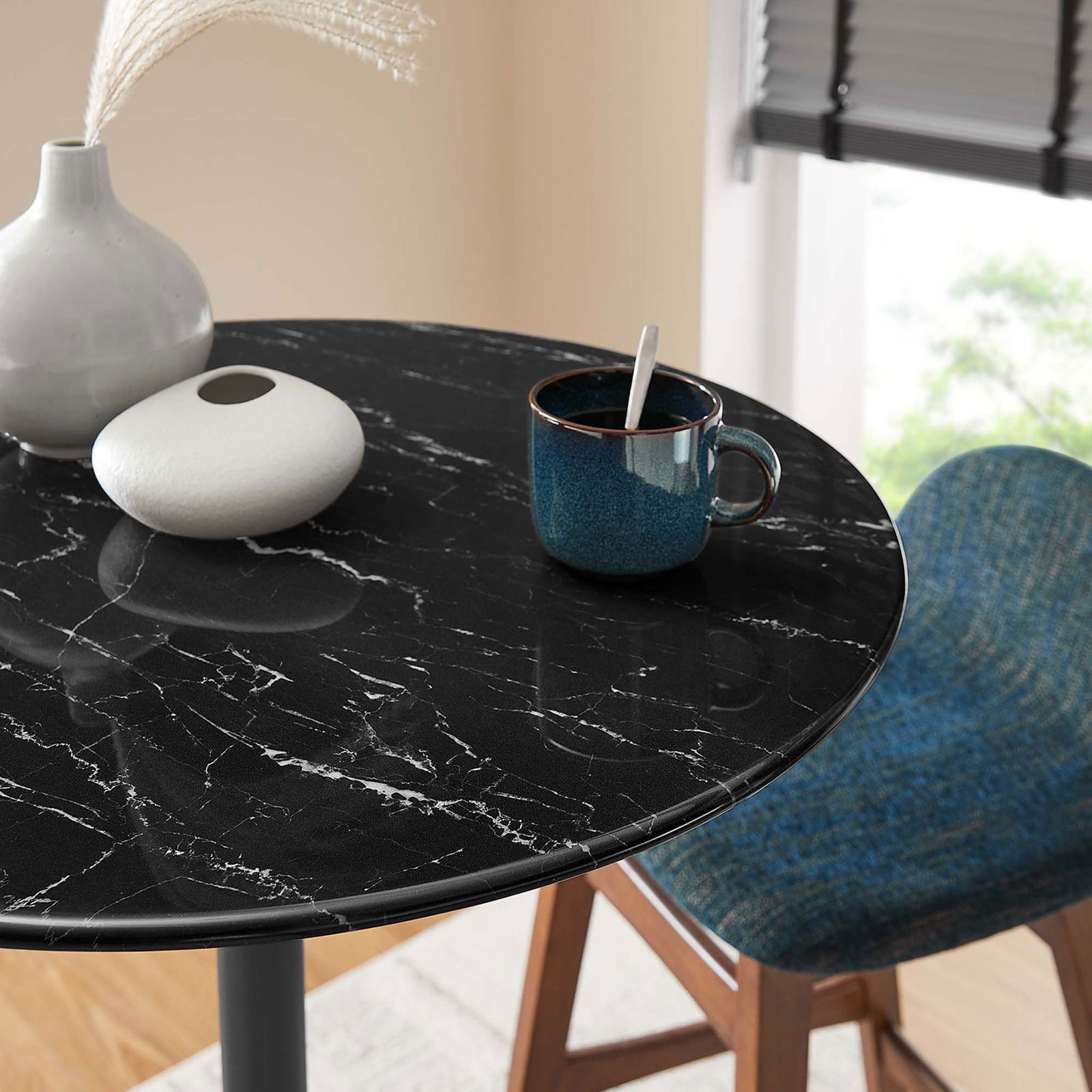 Glossy black faux marble surface with elegant veining elevates everyday dining || EEI-4892-BLK-BLK || detail_room