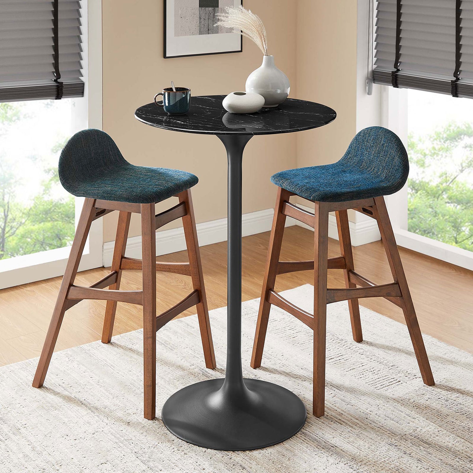 Modern pedestal bar table anchors a cozy dining nook with a black faux marble round top || EEI-4892-BLK-BLK || front_angle_room