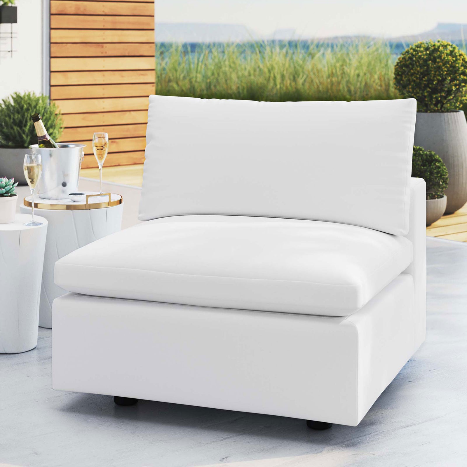 White Sunbrella armless chair styled on a modern patio, creating a bright, inviting lounge spot || EEI-4905-WHI || front_angle_room