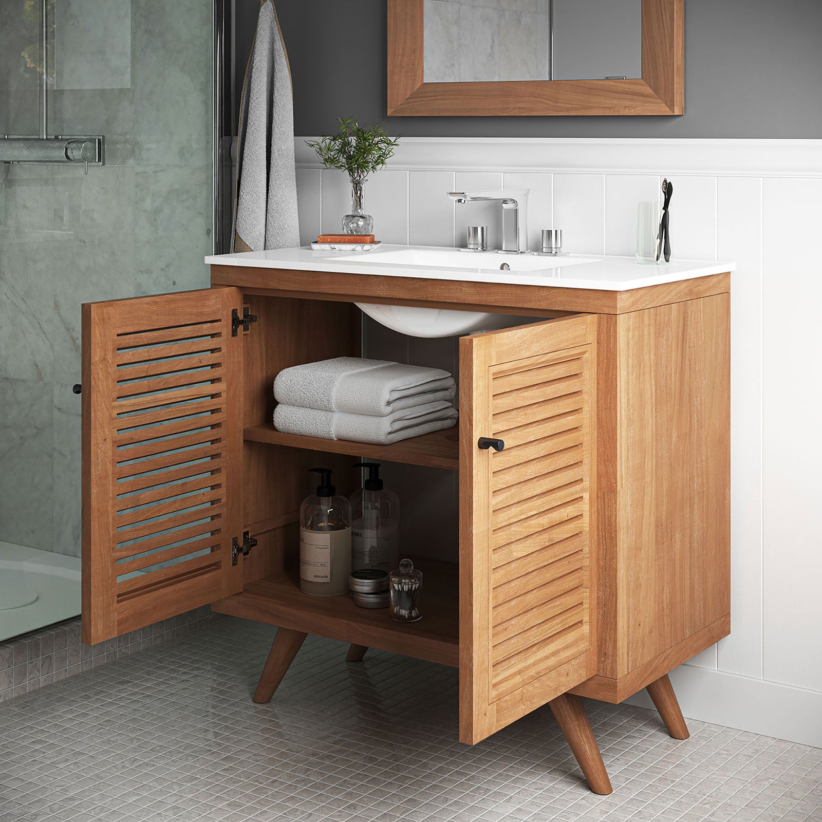Open doors reveal neatly organized storage in a warm teak cabinet with white sink || EEI-5113-NAT-WHI || front_angle_open_room