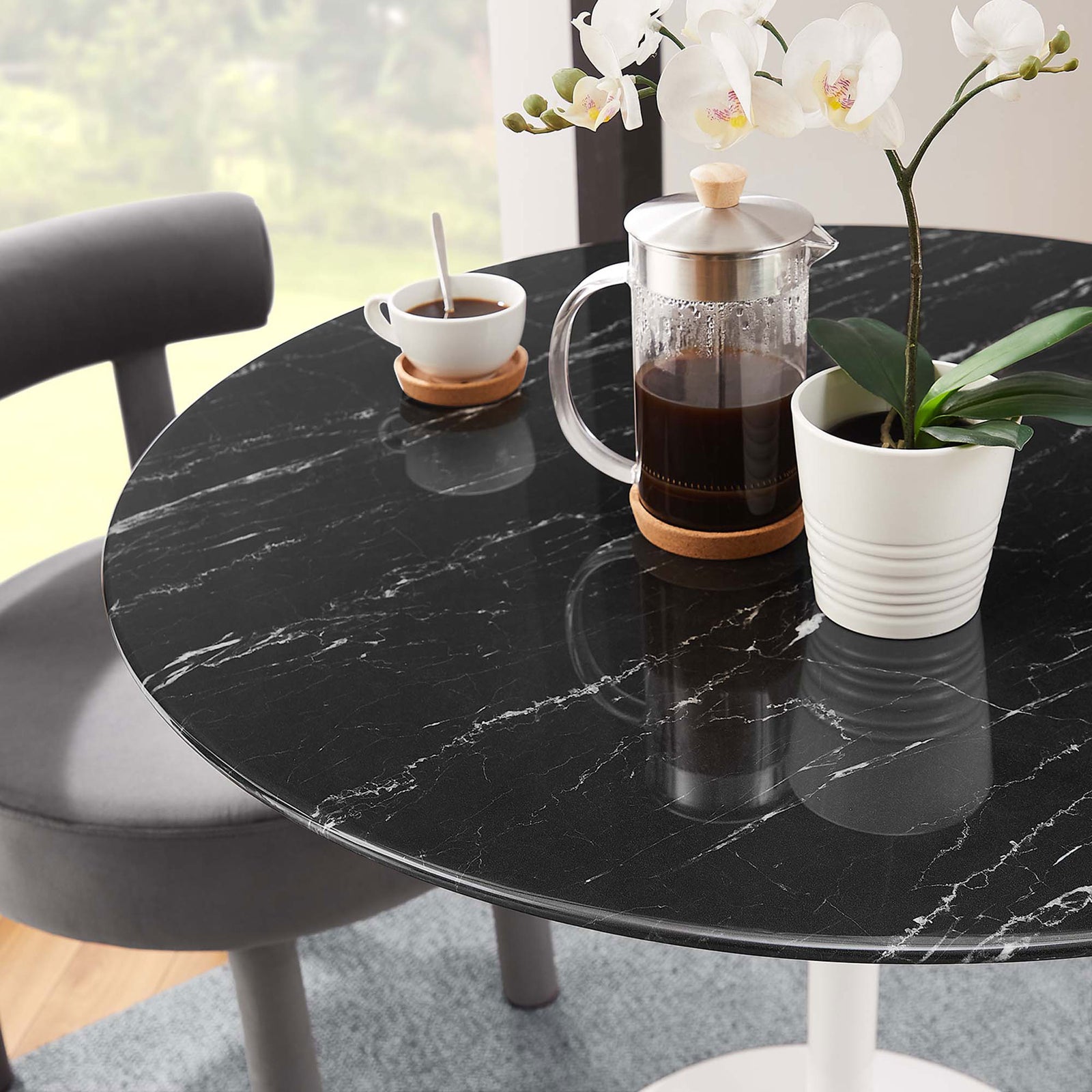Black faux marble tabletop styled with coffee service and orchid for a cozy breakfast spot || EEI-5168-WHI-BLK || detail_room