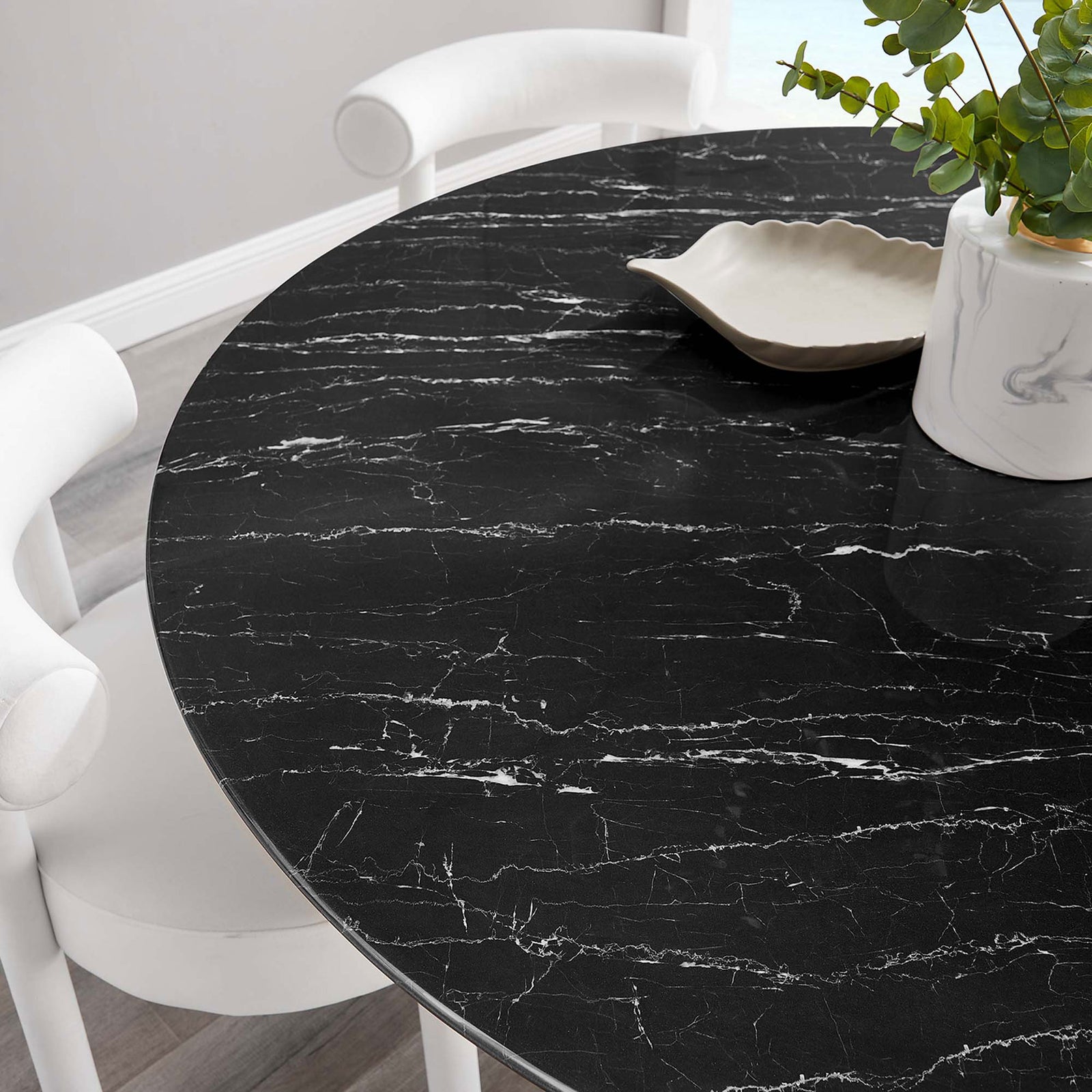 Black faux marble tabletop styled with white decor and greenery to showcase its bold veining pattern || EEI-5241-GLD-BLK || detail_room