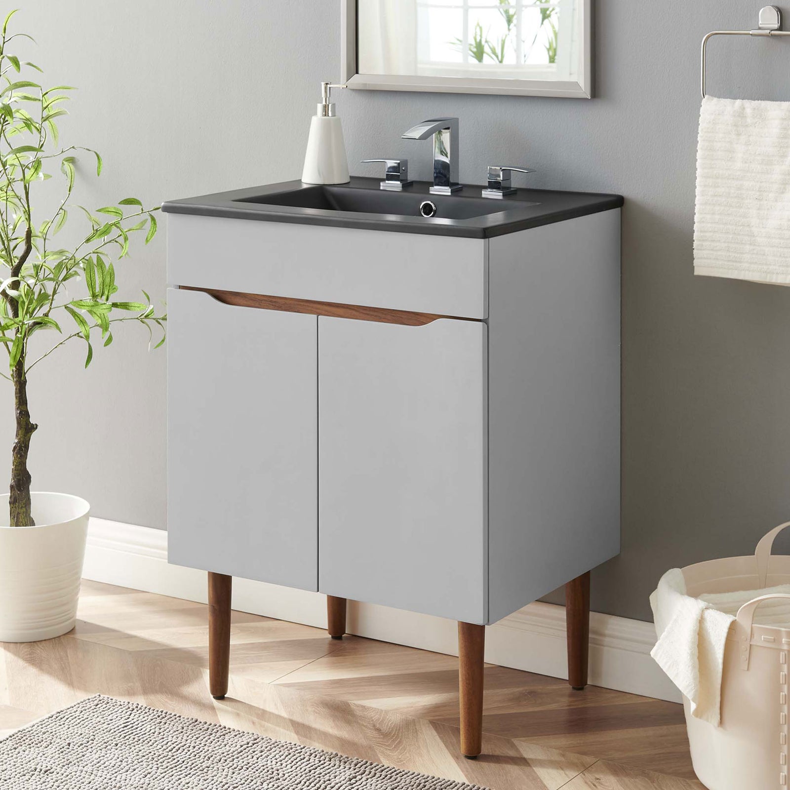 Mid-century gray vanity with black basin and warm wood legs elevates any bathroom || EEI-5357-GRY-BLK || front_angle_room