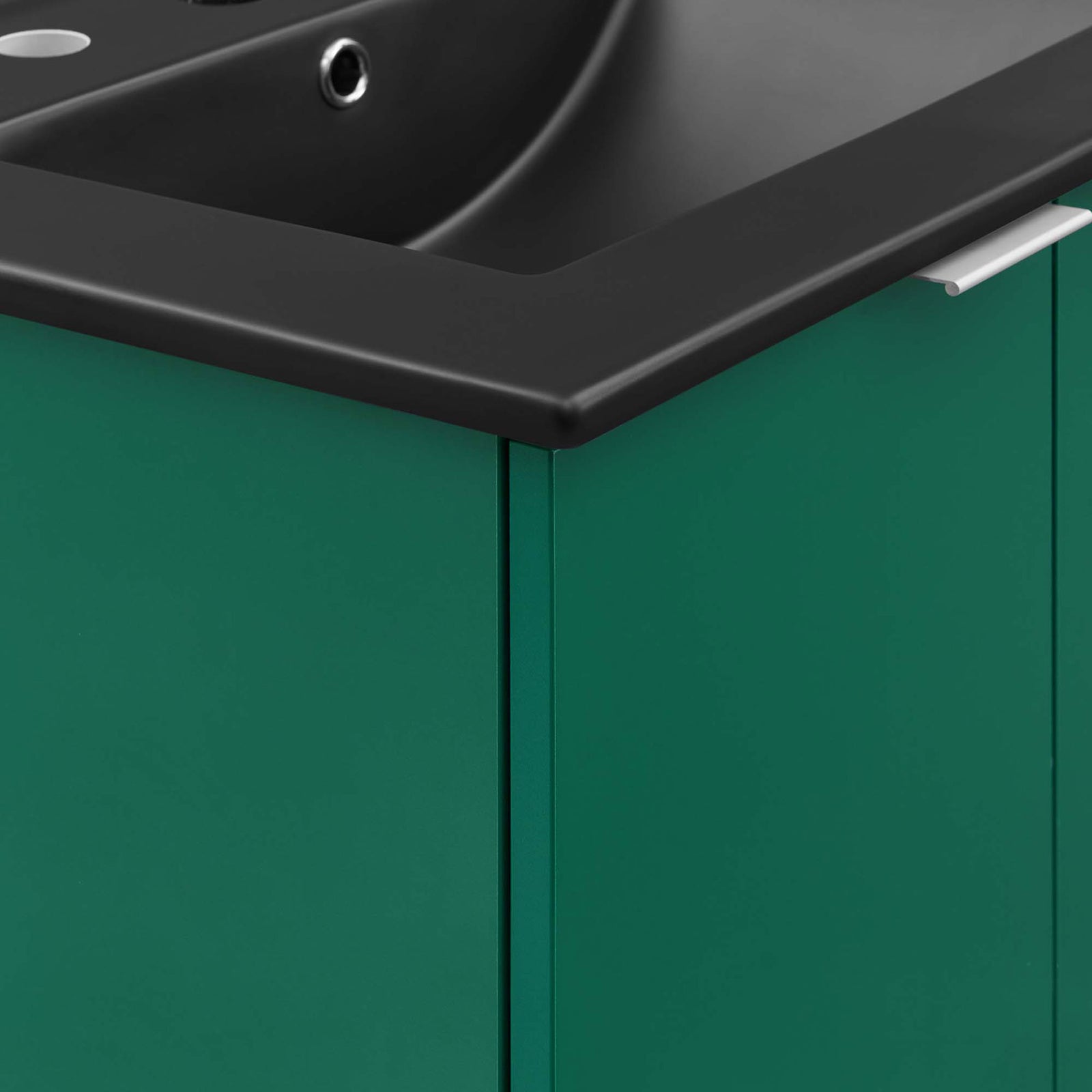 Matte black countertop edge and slim L-shaped metal pull against the green cabinet || EEI-5370-GRN-BLK || detail_studio