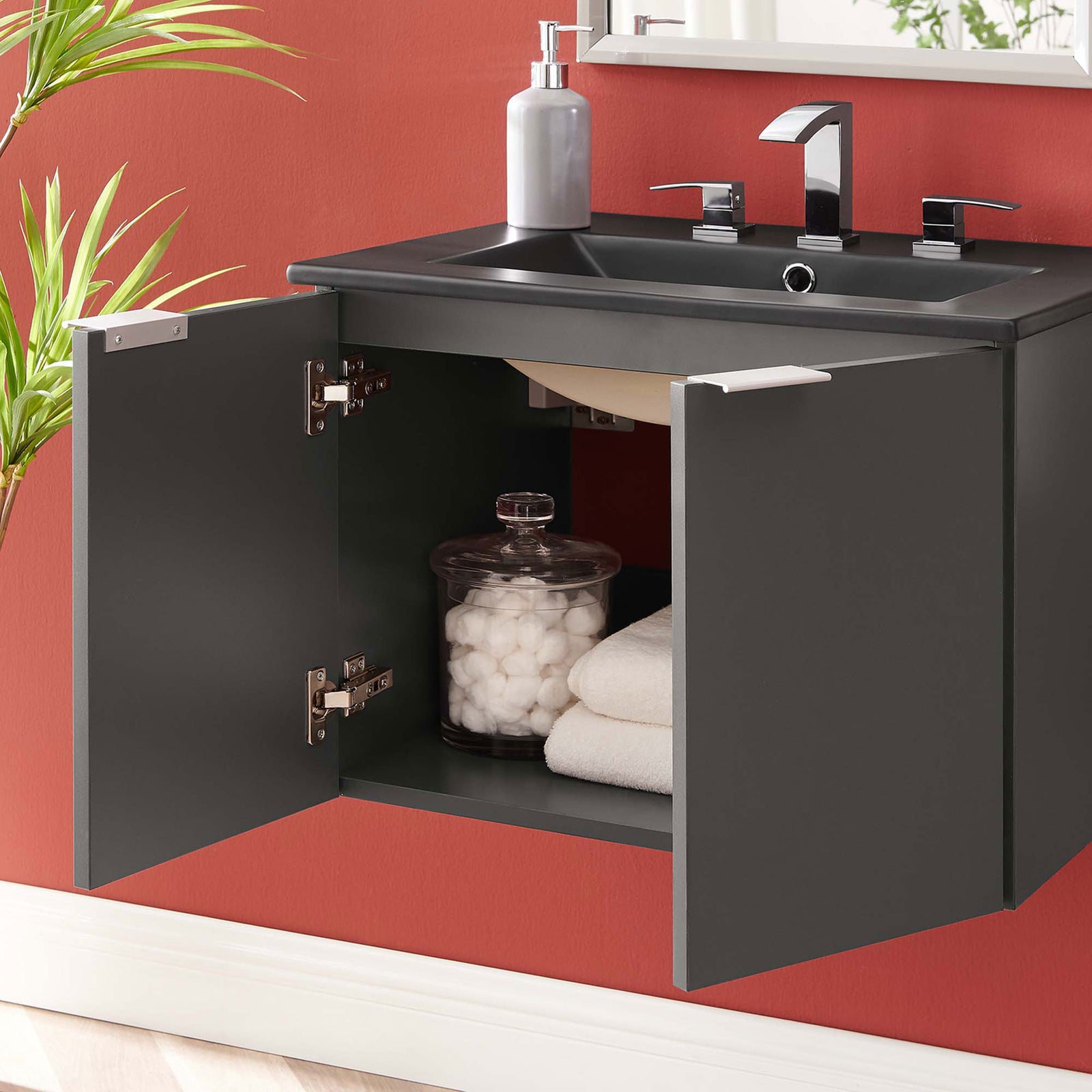 Everyday essentials tuck neatly inside the open vanity with a shelf beneath the integrated sink || EEI-5370-GRY-BLK || front_open_room