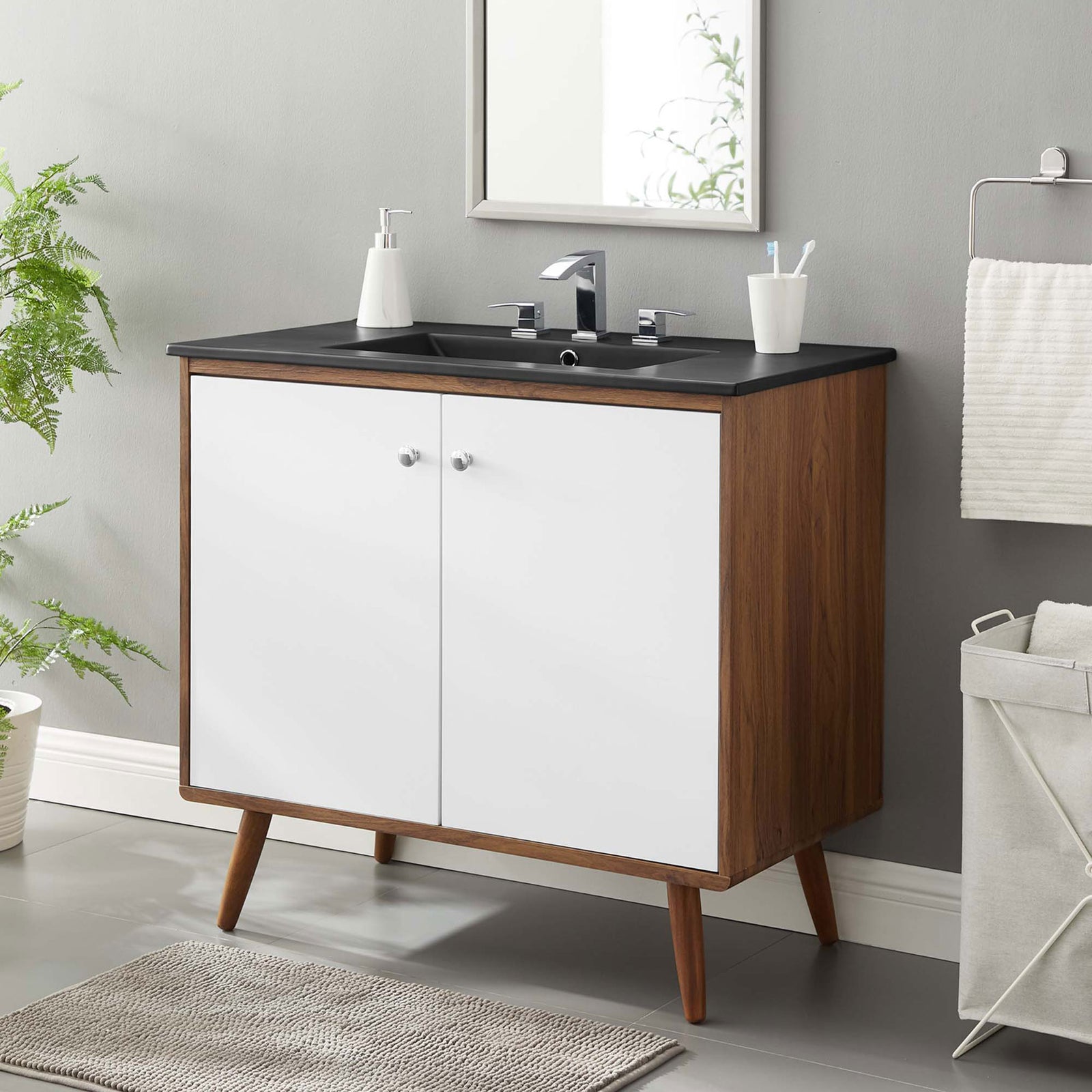 Sleek black top and crisp white doors deliver modern contrast with mid-century warmth || EEI-5394-WAL-BLK || front_angle_room