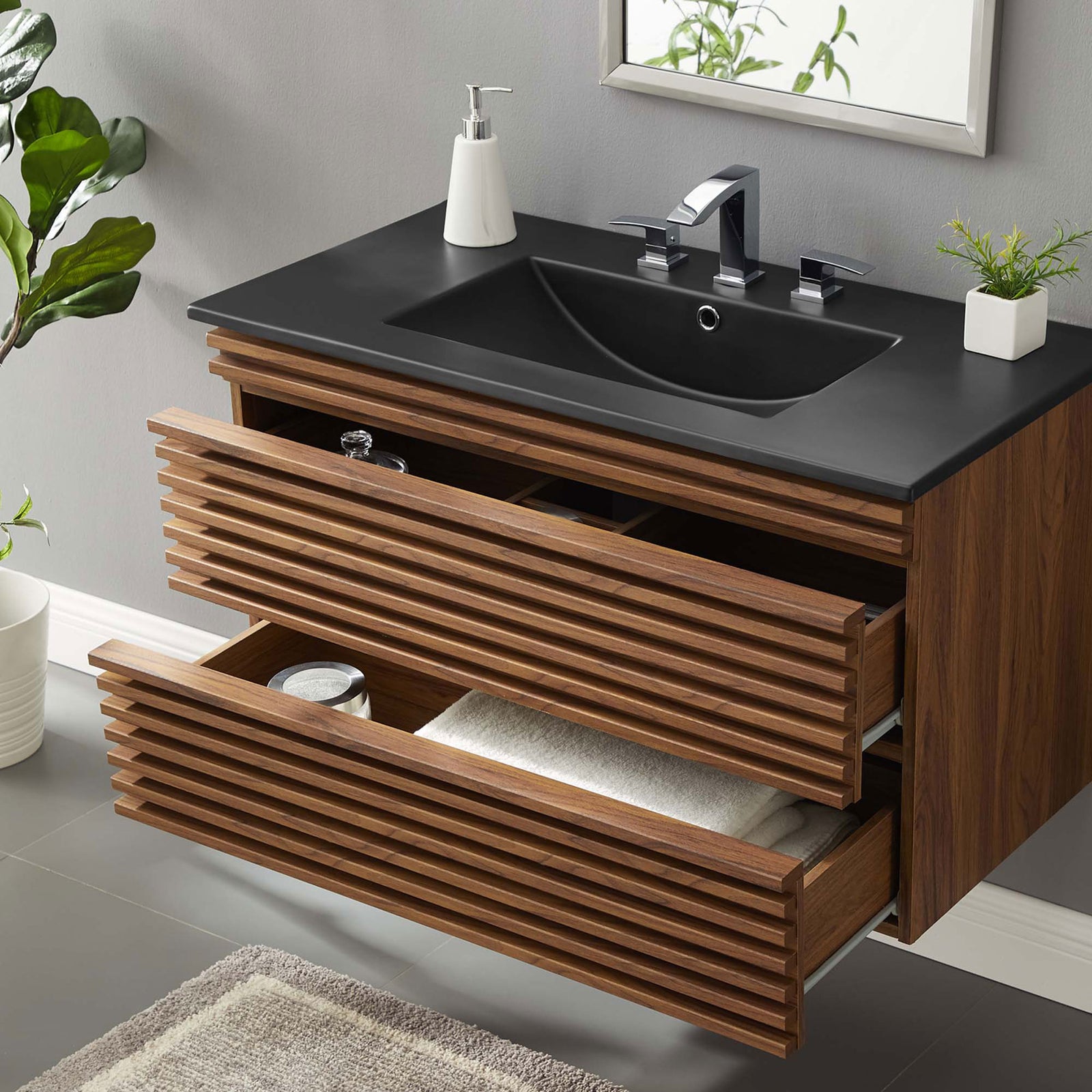 Roomy storage drawers glide out for easy access beneath the integrated countertop basin. || EEI-5395-WAL-BLK || front_angle_open_room