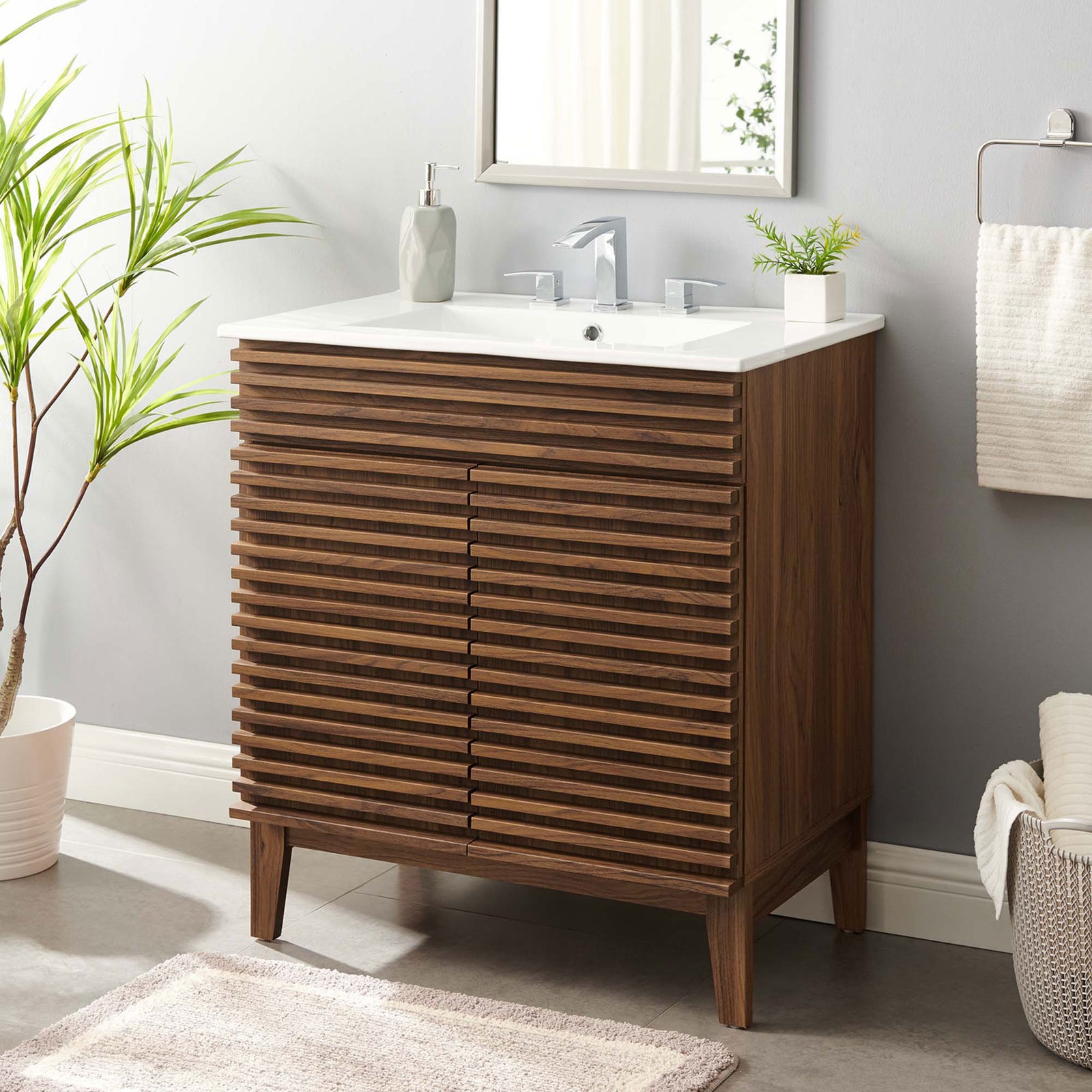 Modern vanity adds warm wood texture and a clean white top to the bath. || EEI-5422-WAL-WHI || front_angle_room