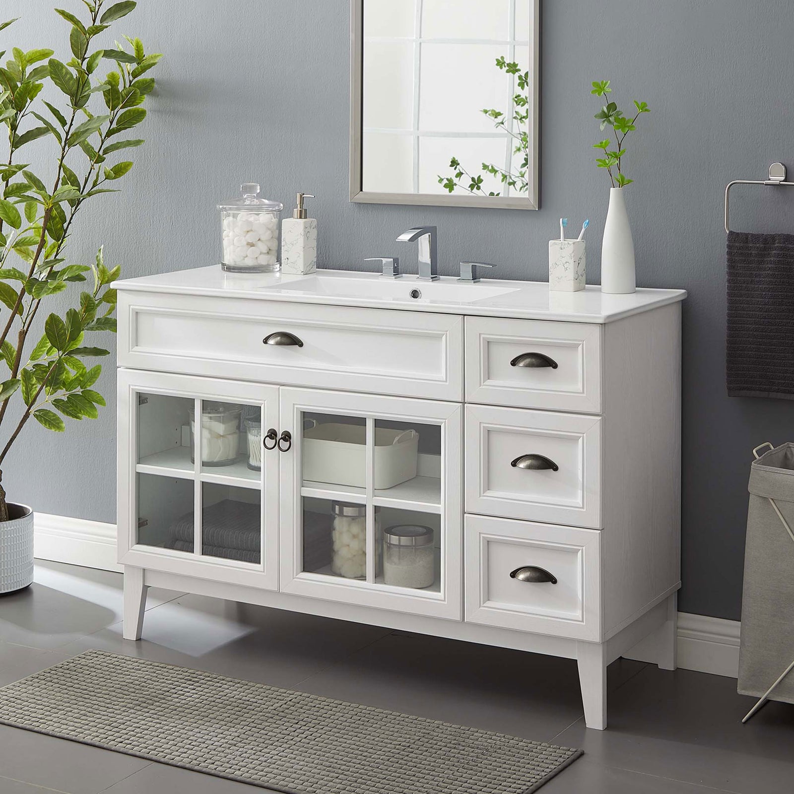 Refined coastal look with windowpane doors, three drawers, and a durable sink top || EEI-5427-WHI-WHI || front_angle_room