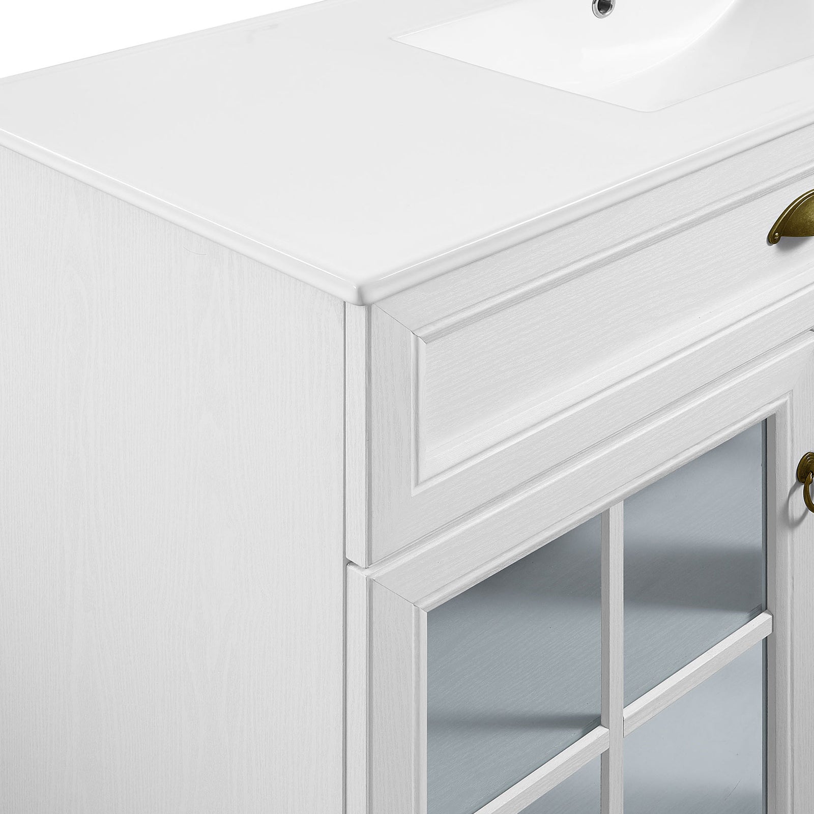 Crisp frame detailing and brushed brass cup pull against the bright white finish || EEI-5427-WHI-WHI || detail_studio