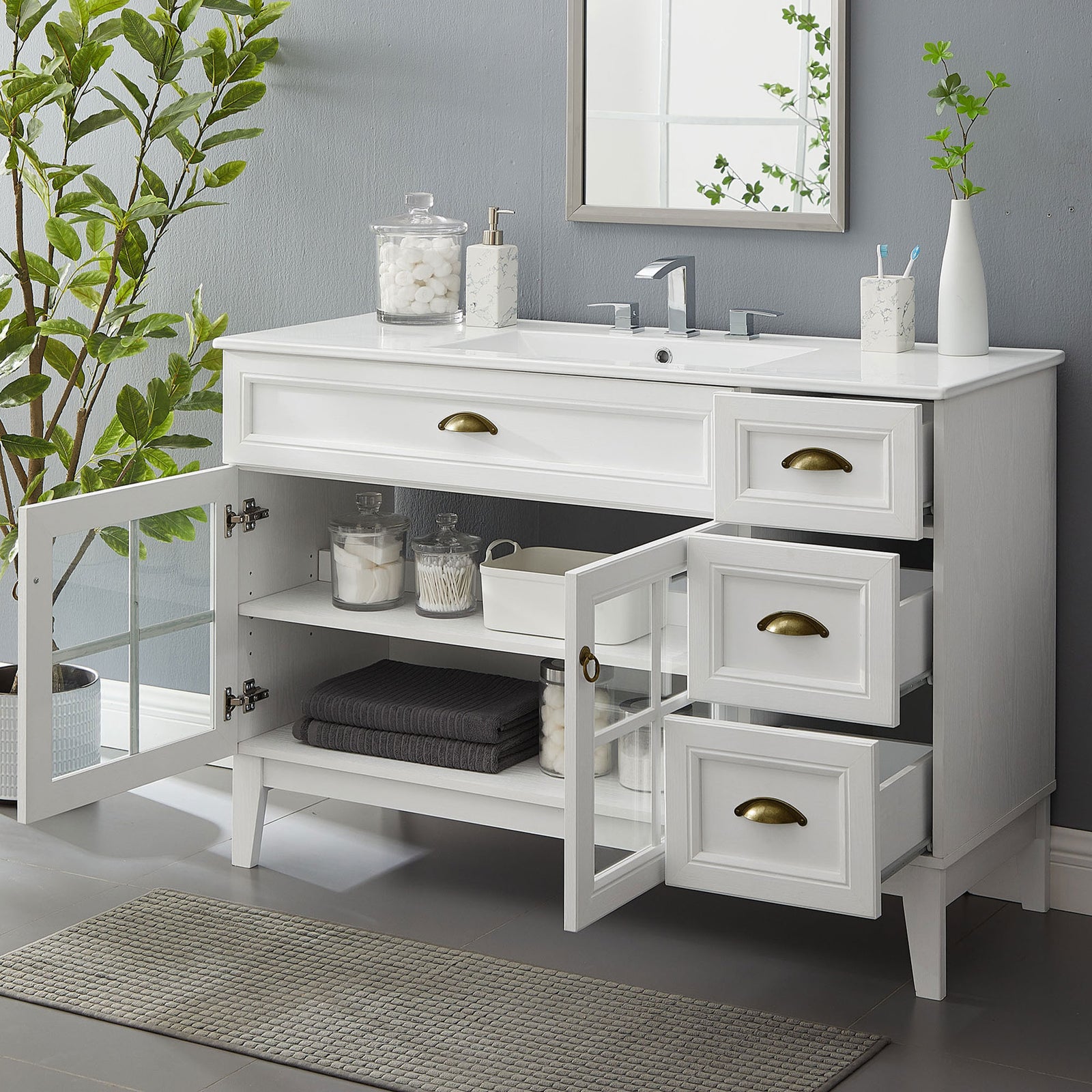Open doors and drawers reveal organized storage, perfect for towels and bath essentials || EEI-5427-WHI-WHI || front_angle_open_room