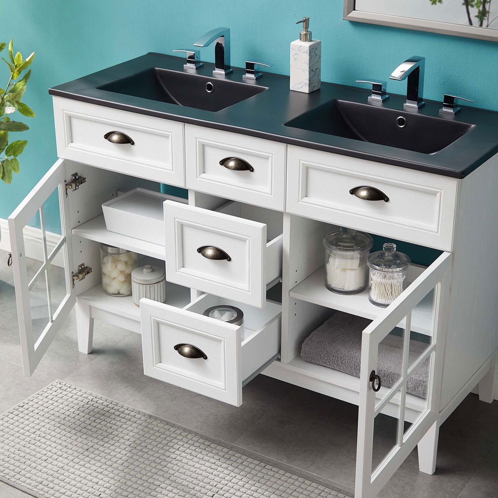 Ample storage for towels and jars with drawers and shelves neatly organized behind glass doors. || EEI-5480-WHI-BLK || front_angle_open_room