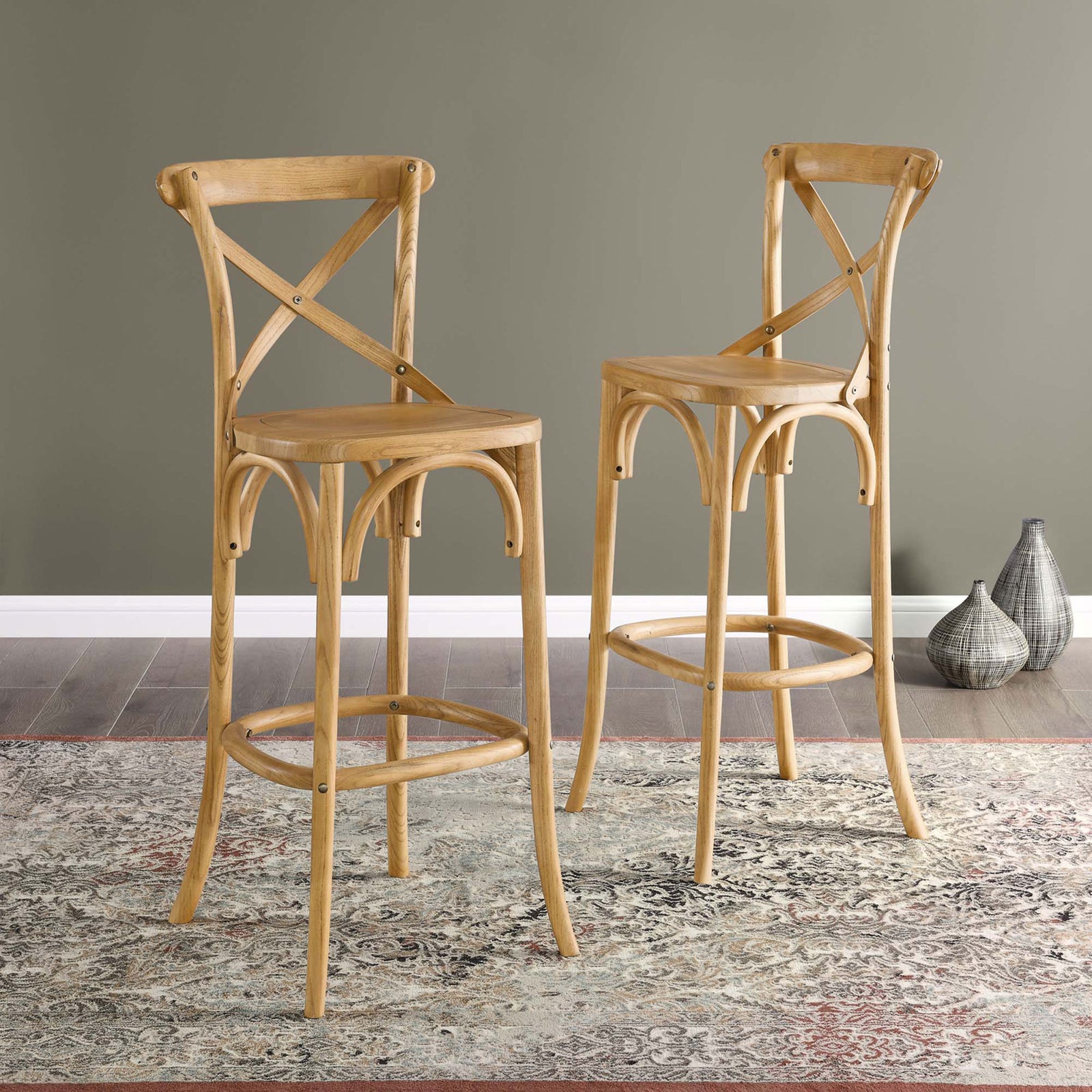 Two natural wood bar stools bring warm tone and classic cross-back character to the room || EEI-5563-NAT || front_angle_room