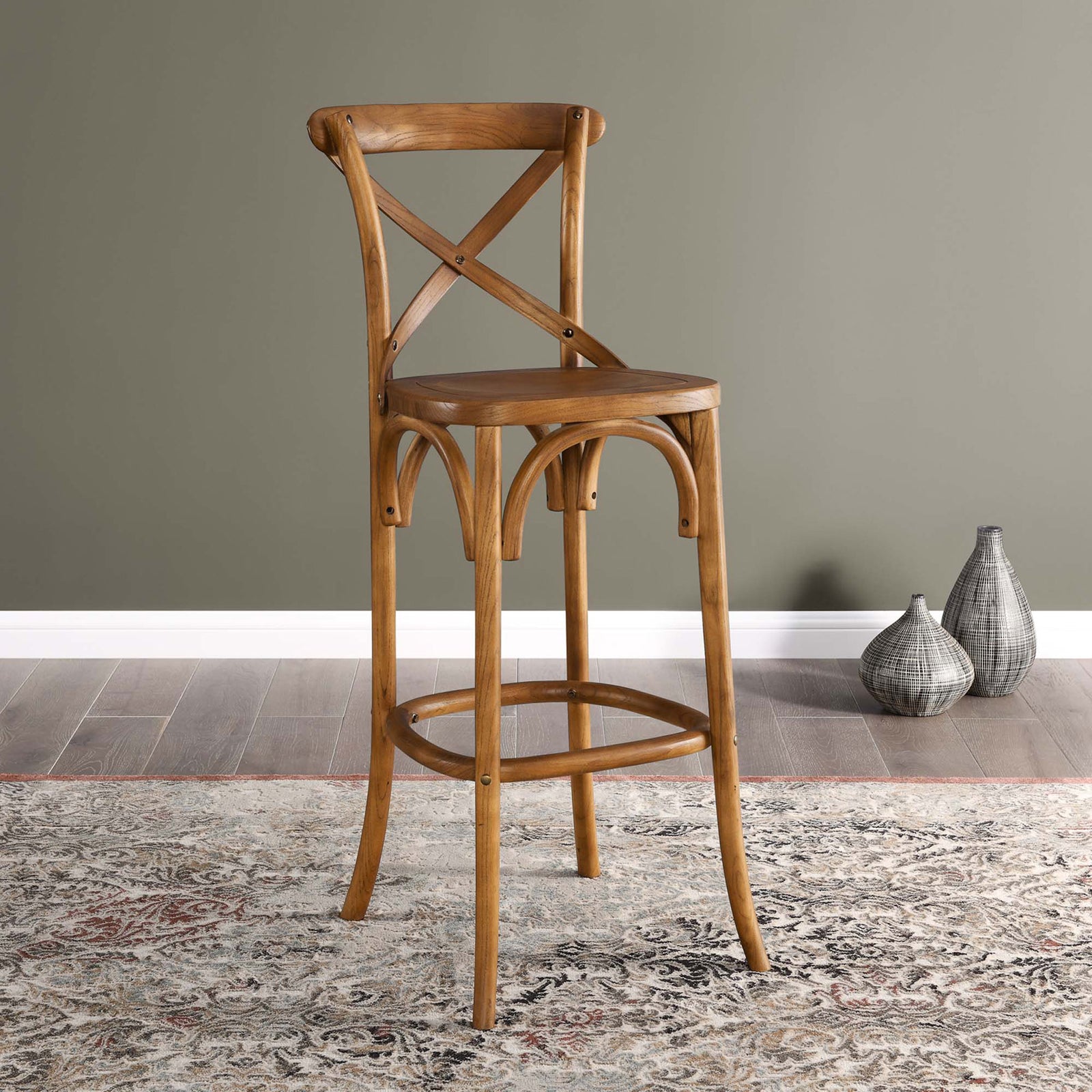 Walnut bar stool accents the space with a classic X-back and graceful arches || EEI-5563-WAL || front_angle_room