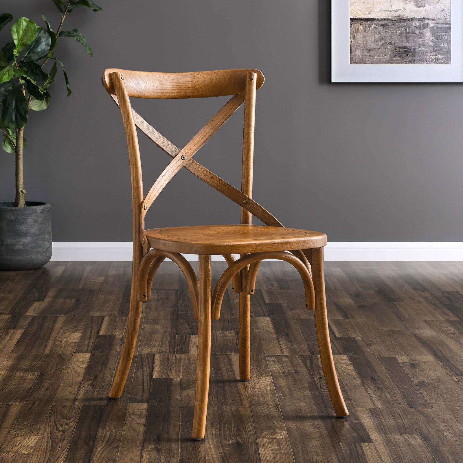 Walnut Gear dining chair styled in a contemporary dining room with wood floors and wall art || EEI-5564-WAL || front_angle_room