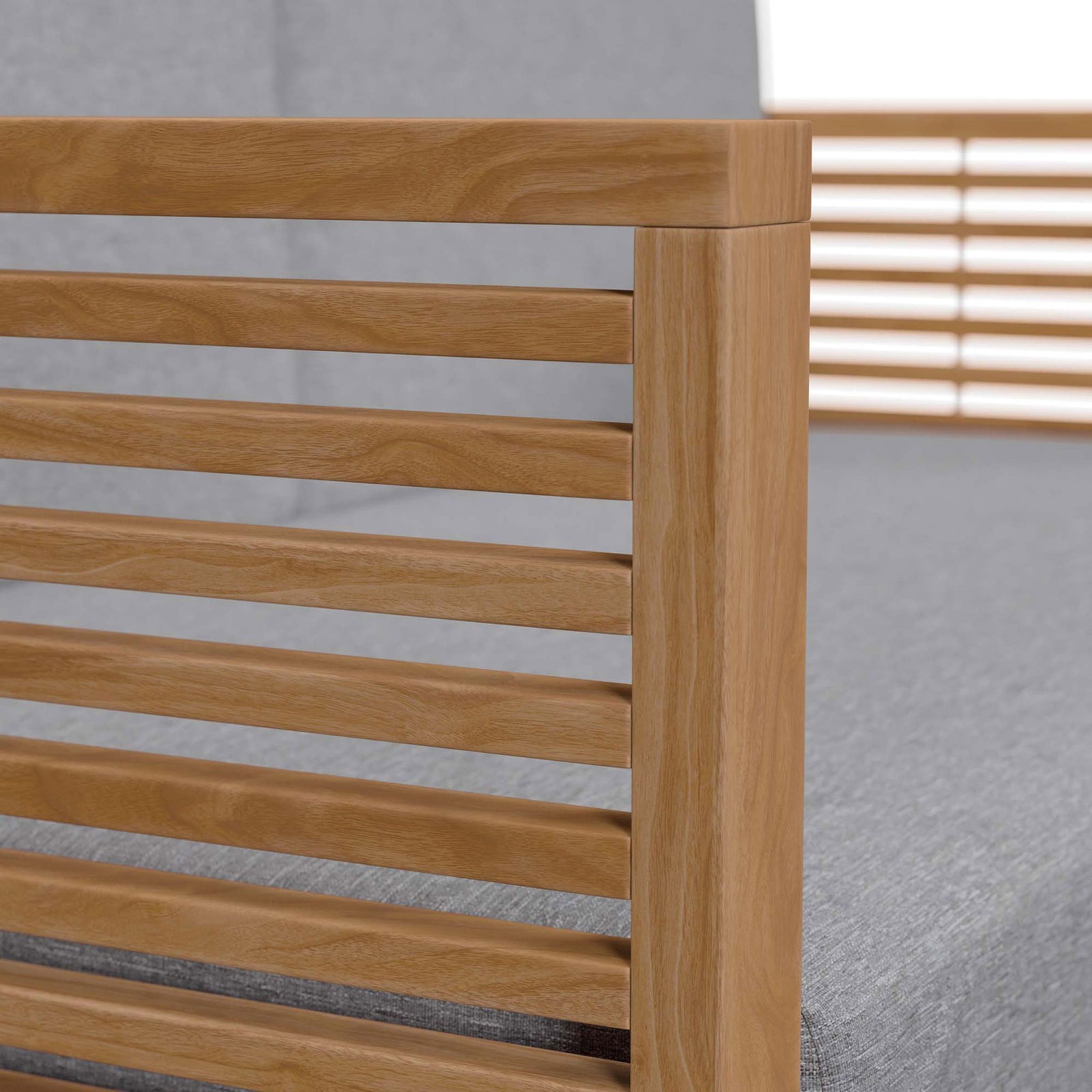 Close-up of the smooth teak armrest and tailored gray cushion for a refined modern outdoor look. || EEI-5605-NAT-GRY || detail_studio
