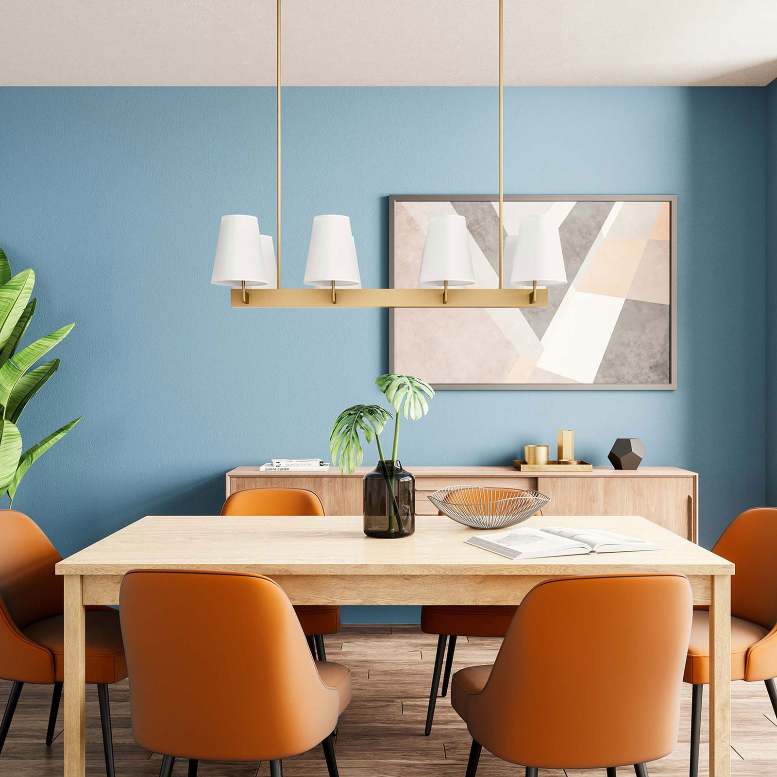 Modern linear chandelier elevates a dining room with satin brass warmth and crisp white shades || EEI-5642-WHI-SBR || front_angle_room
