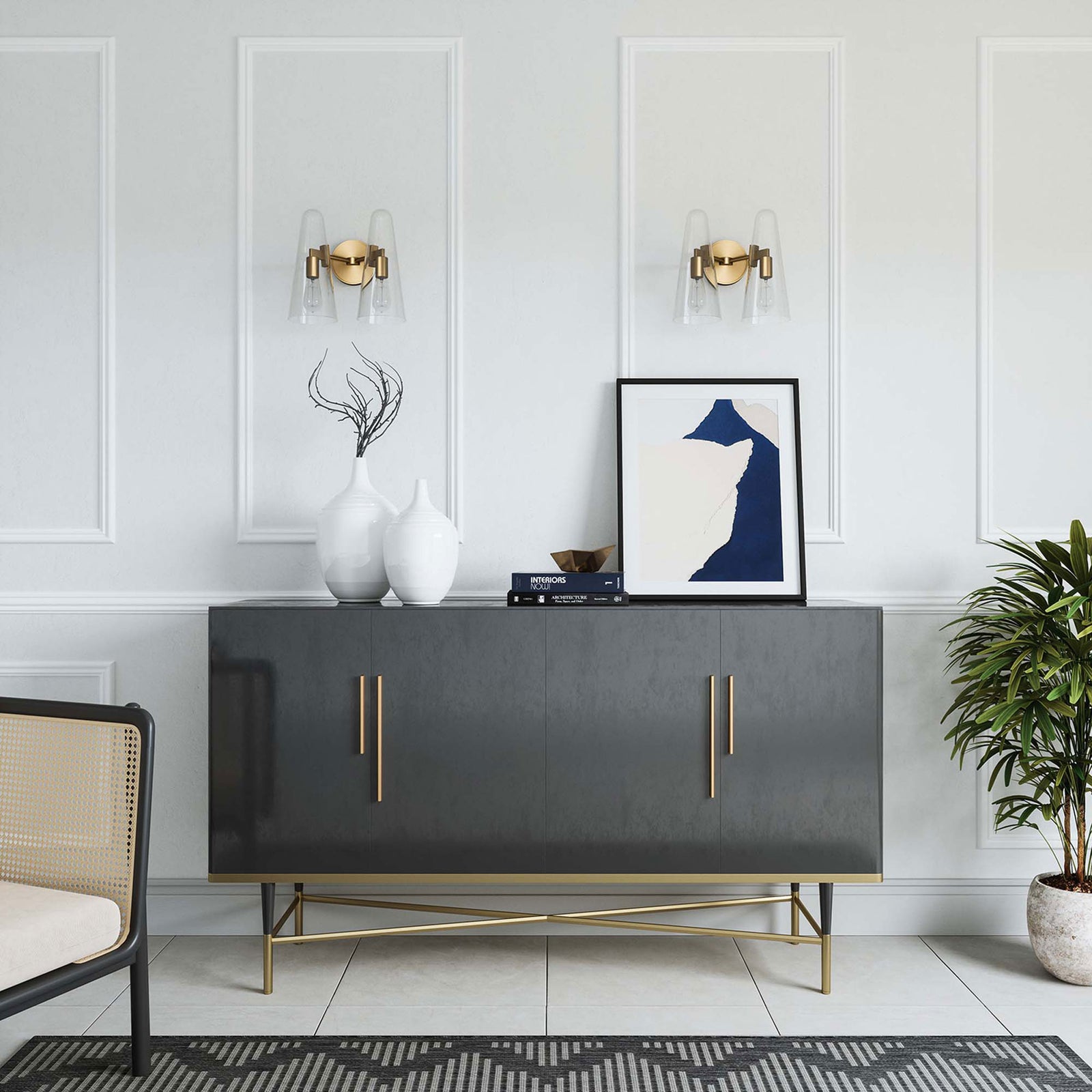 Pair of Beacon satin brass wall sconces with clear glass cones styled above a modern console || EEI-5646-CLR-SBR || front_room