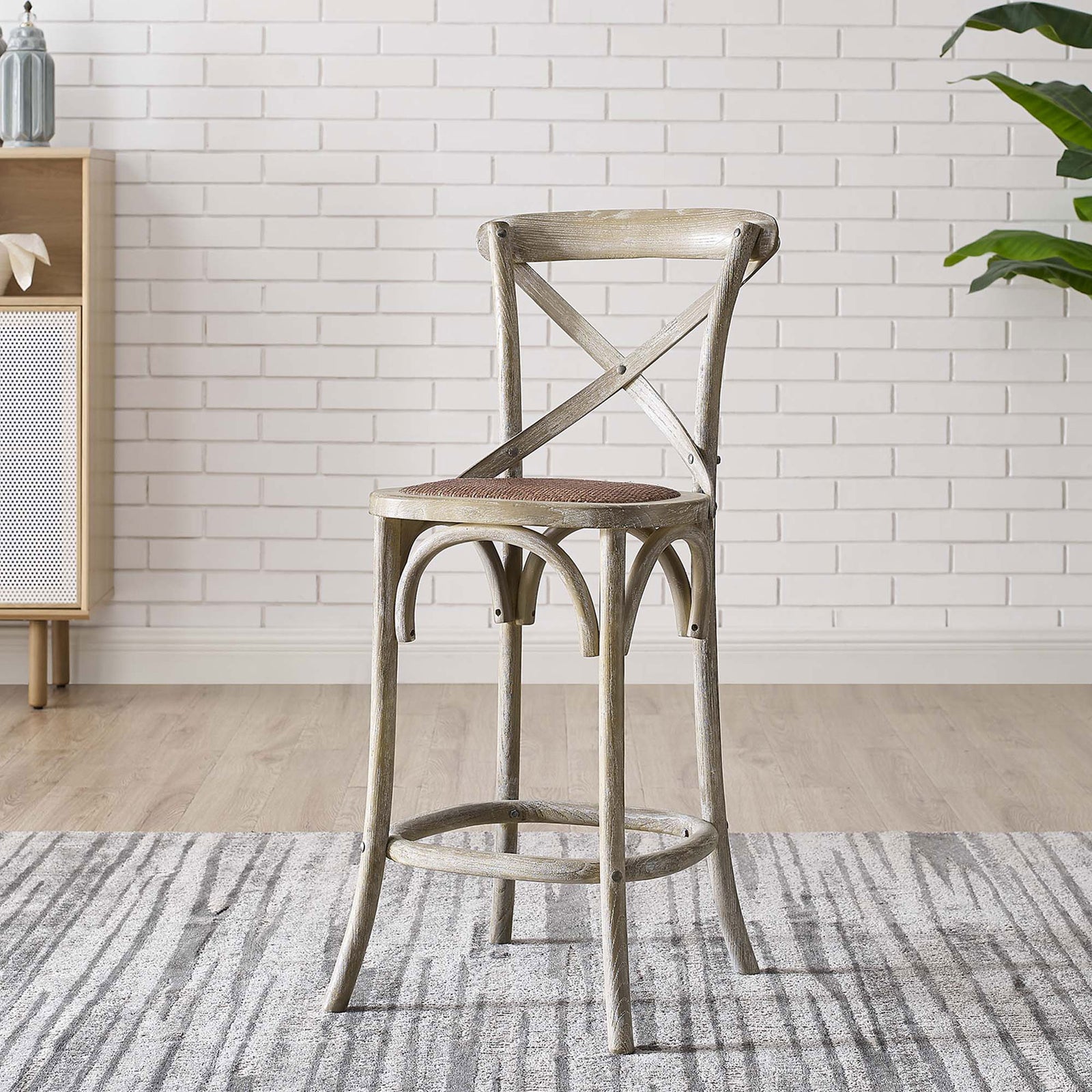 Counter stool adds rustic warmth to the kitchen with its cross-back and handwoven rattan seat || EEI-5667-GRY || front_angle_room
