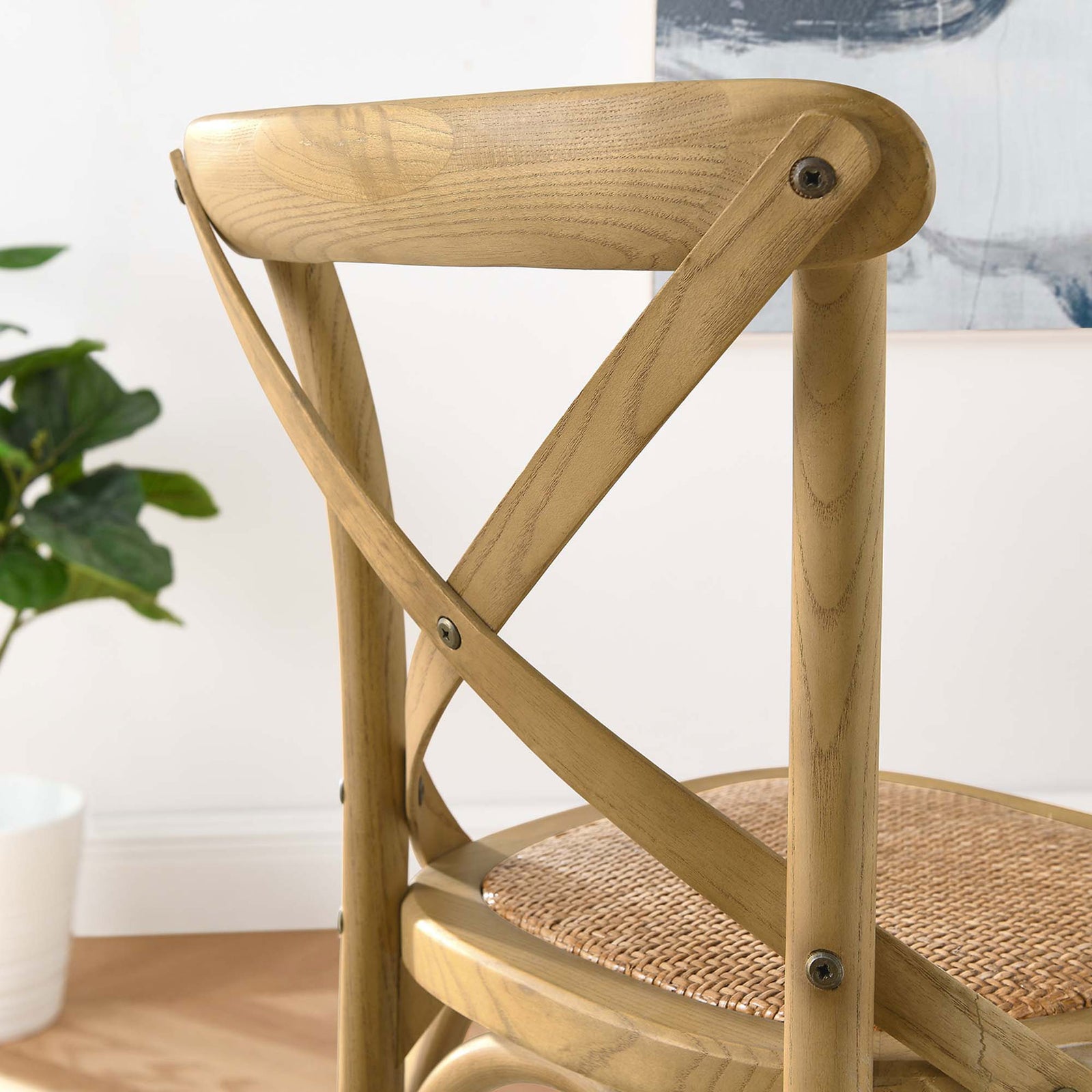 Smooth-finished X-brace back shows the artisan wood grain of the counter stool. || EEI-5667-NAT || detail_room