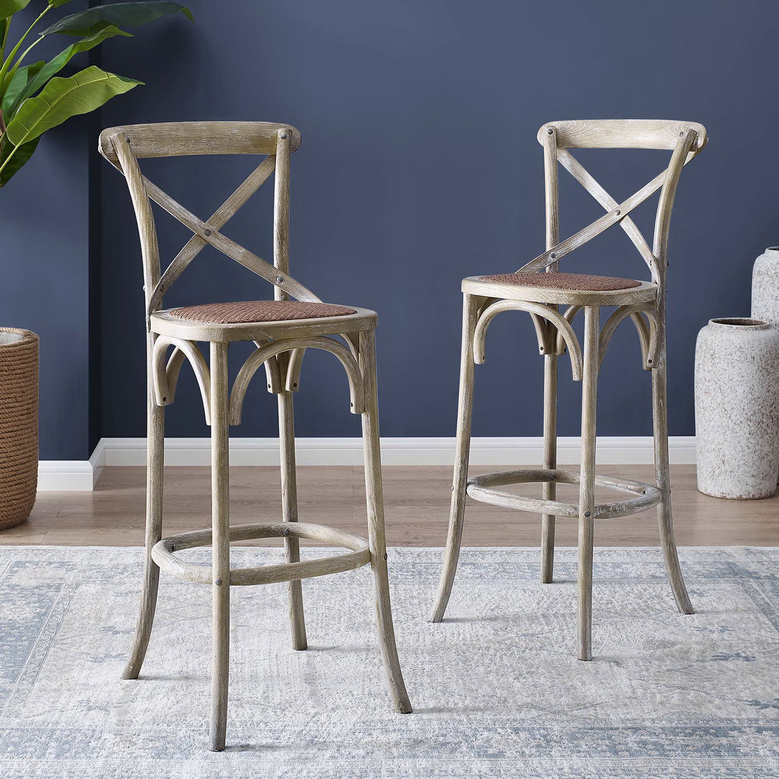 Elevate your bar area with weathered gray seating that pairs a curved footrest and handwoven rattan seat || EEI-5668-GRY || front_angle_room