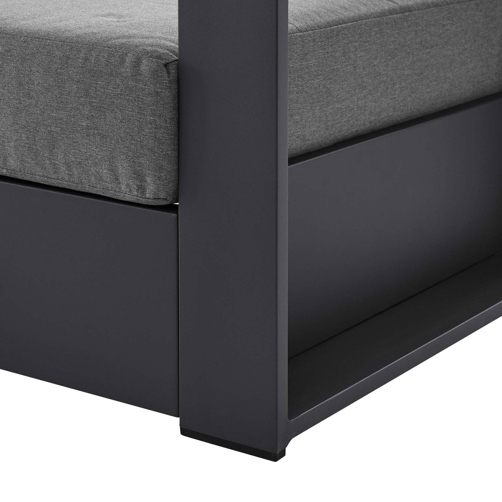 Detail of Tahoe armchair leg showing clean-lined charcoal aluminum base with protective foot glides || EEI-5675-GRY-CHA || leg_studio