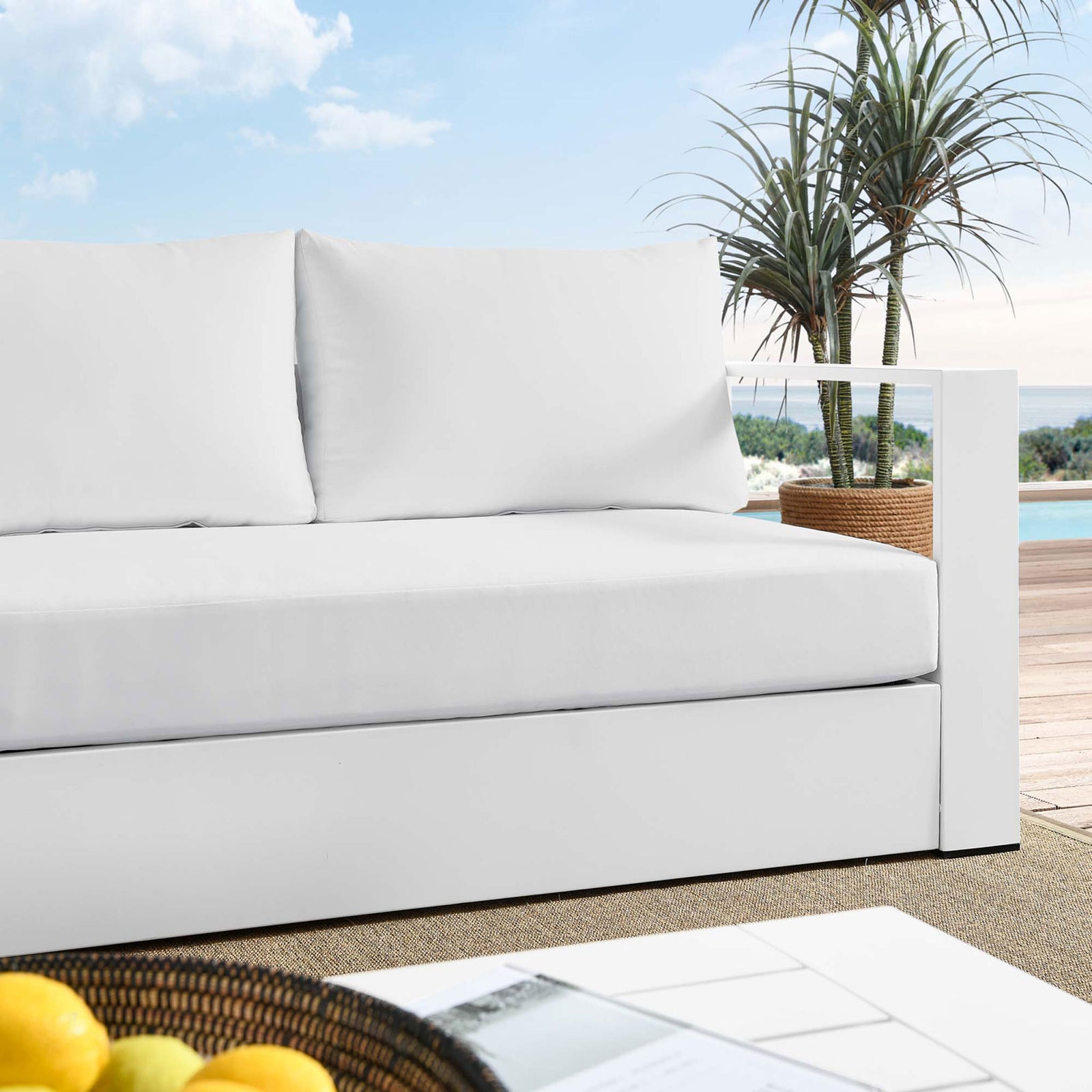 Close lifestyle view of the Tahoe sofa showing soft white cushions and streamlined frame. || EEI-5676-WHI-WHI || detail_room