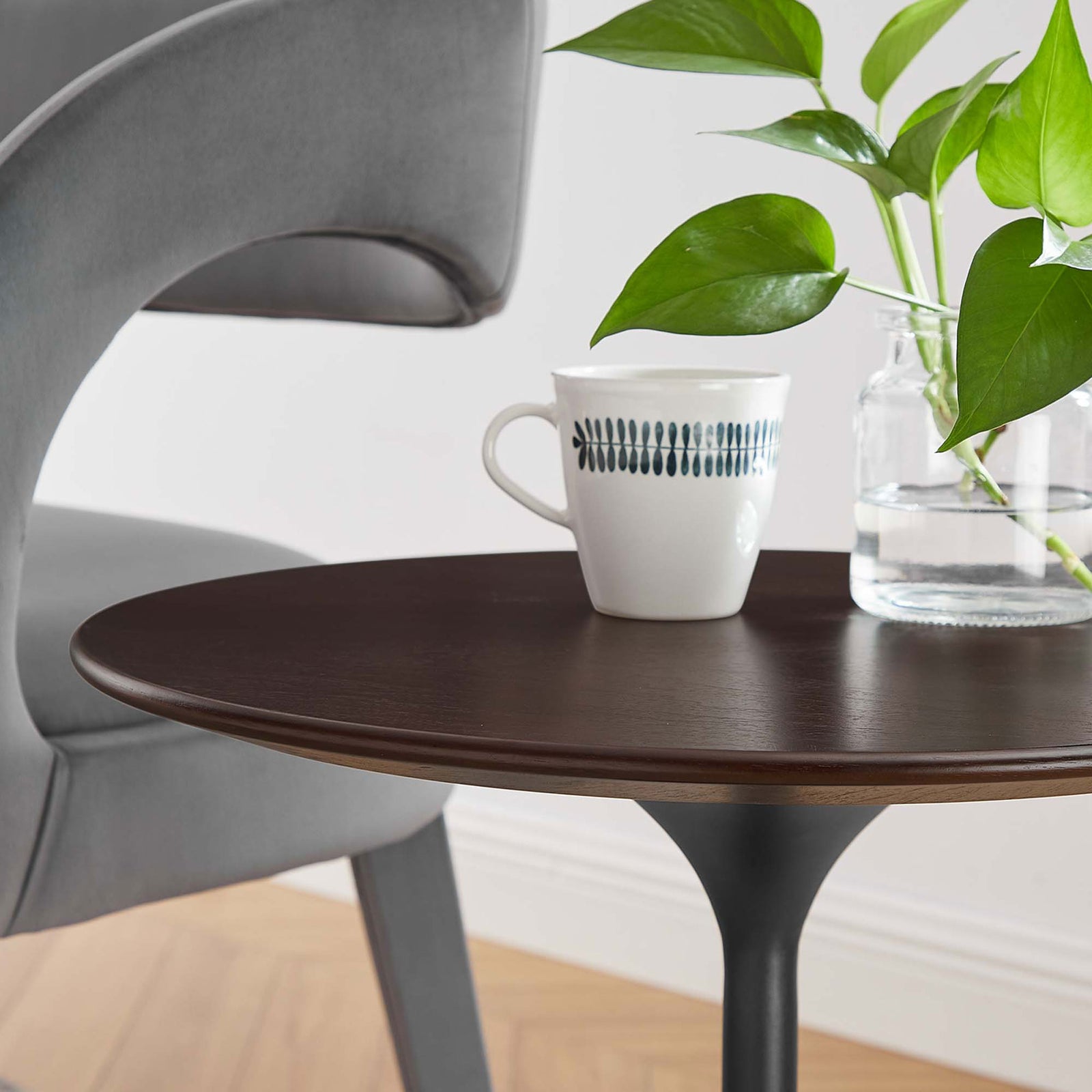 Close up of black cherry tabletop styled with mug and greenery in a cozy living room || EEI-5689-BLK-CHE || detail_room
