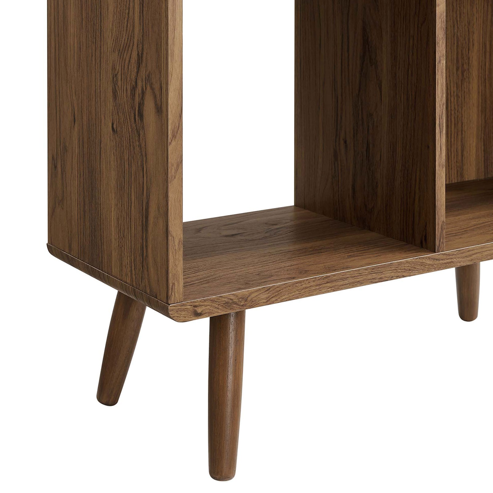 Sturdy splayed dowel wood legs and smooth edge detailing enhance the bookcase's retro style || EEI-5743-WAL || leg_studio