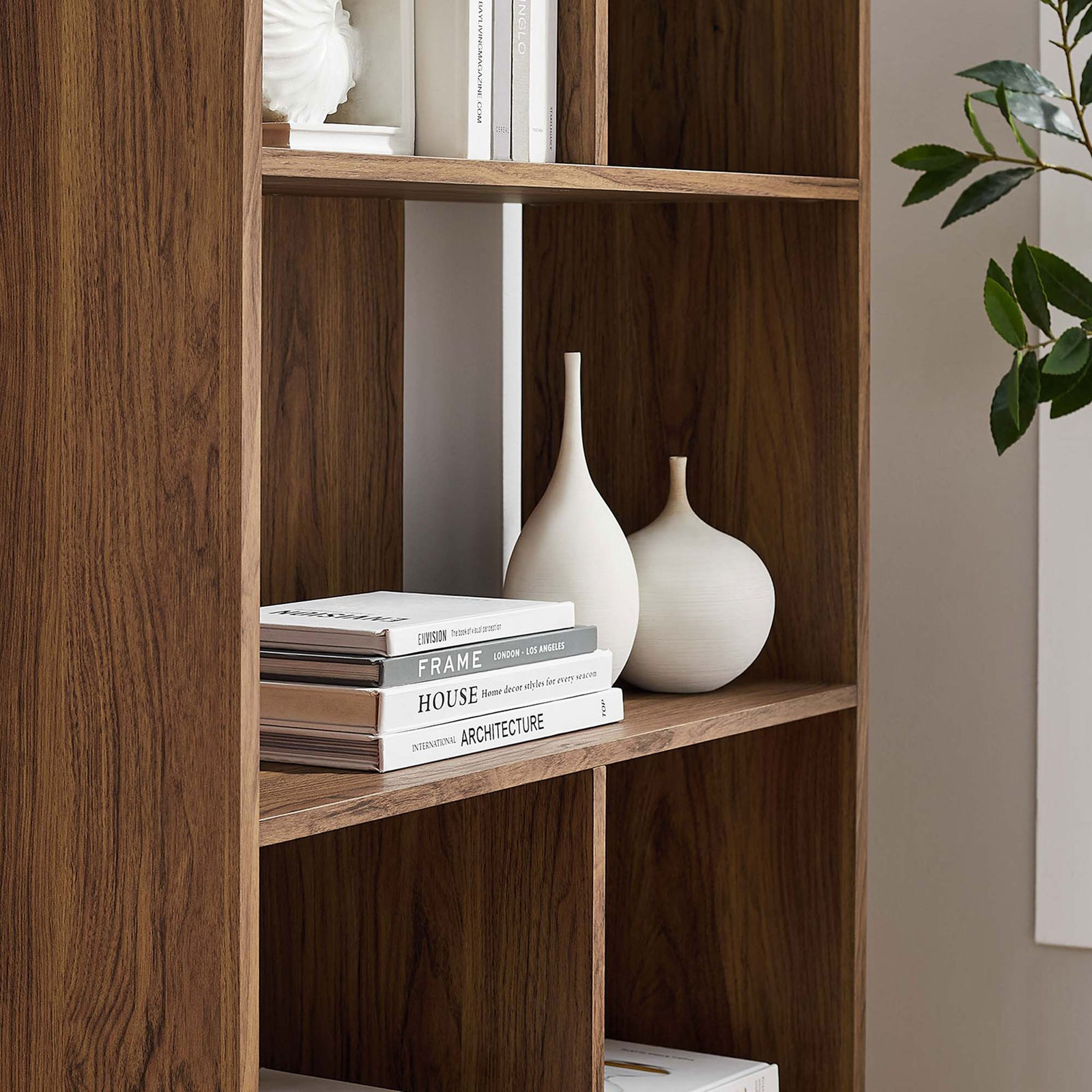 Styled shelves highlight the staggered layout, ideal for books and decor in a modern setting || EEI-5743-WAL || detail_room