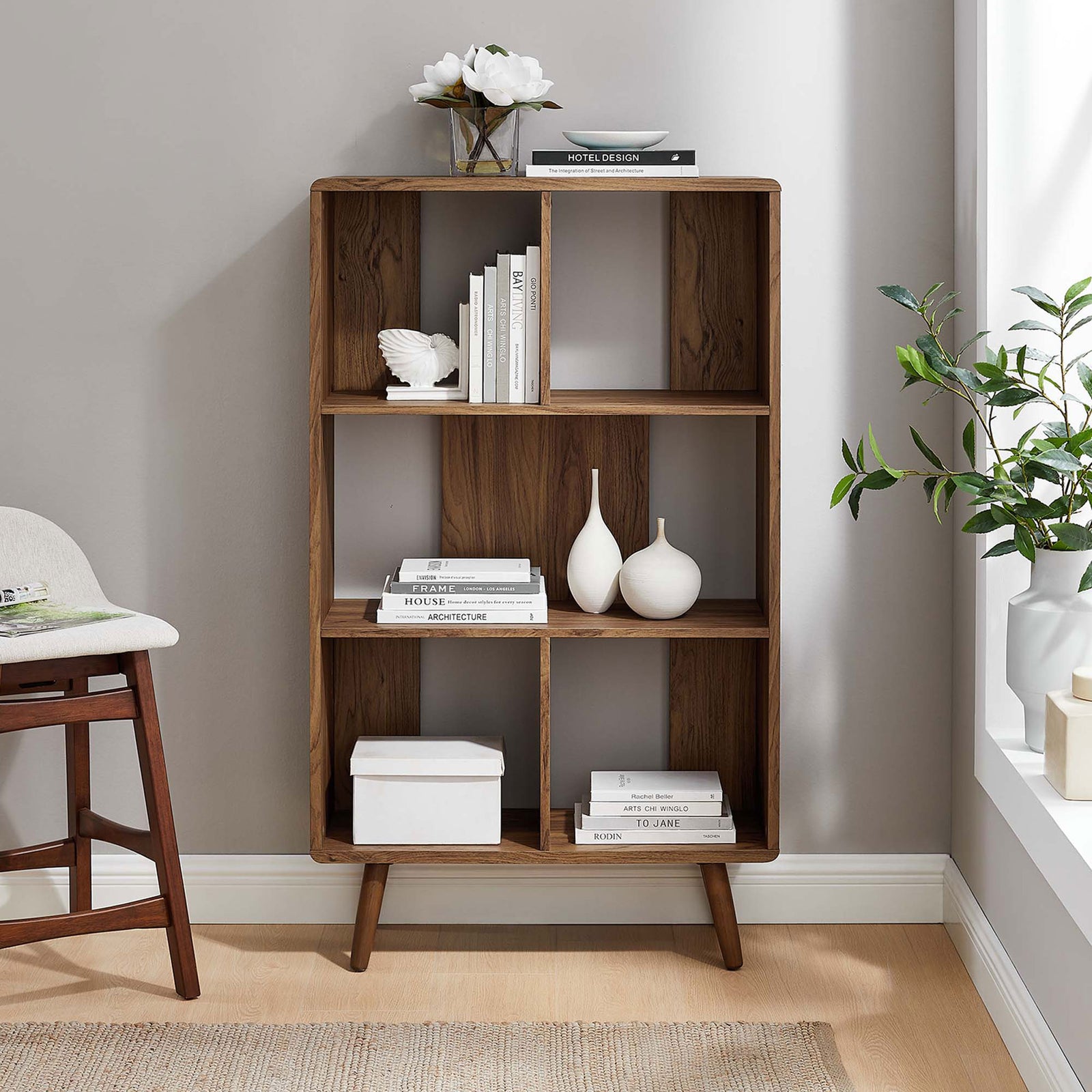 Mid-century walnut bookcase elevates any room with five open display shelves and clean lines || EEI-5743-WAL || front_room