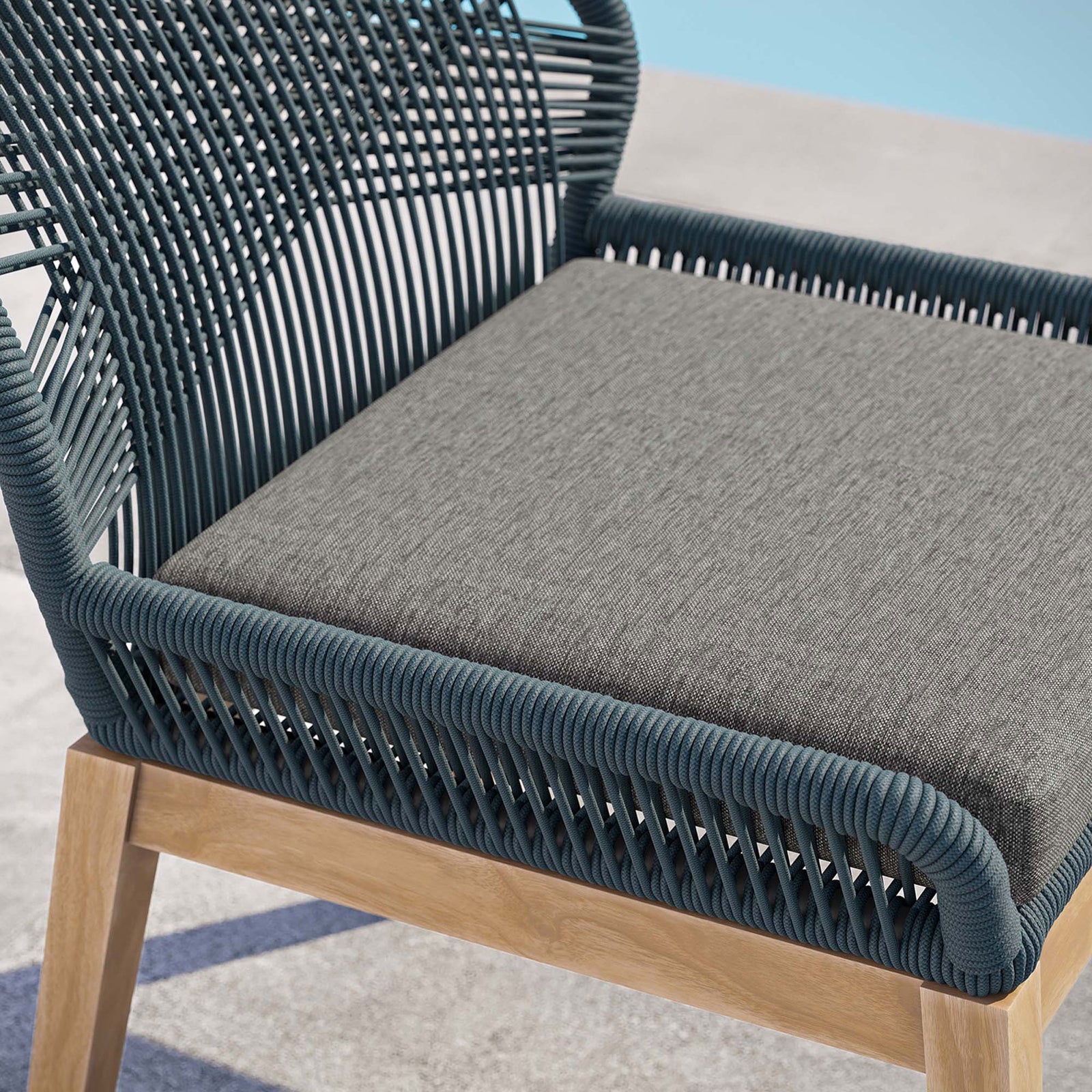 Textured gray cushion and tightly woven blue rope frame highlight the comfort and craftsmanship of this chair || EEI-5747-BLU-GPH || detail_room