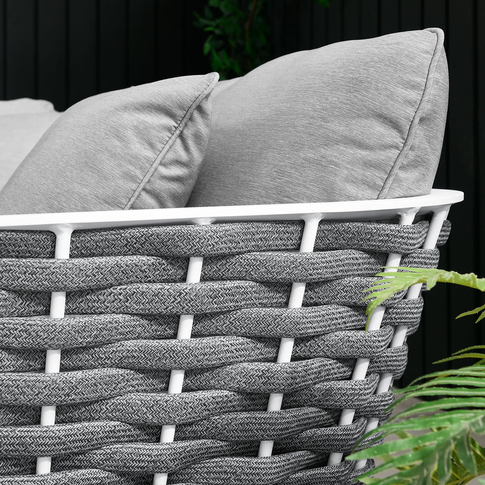 Outdoor setting shows gray cushions and braided rope trim paired with a crisp white frame and greenery || EEI-5752-WHI-GRY || detail_room