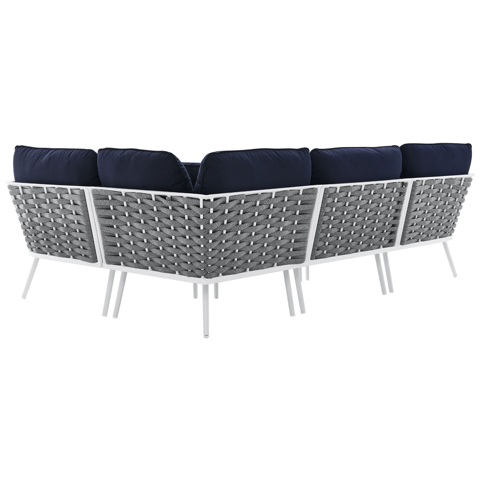 Back of the navy sectional reveals a continuous rope weave and sturdy powder coated aluminum construction. || EEI-5753-WHI-NAV || back_angle_studio