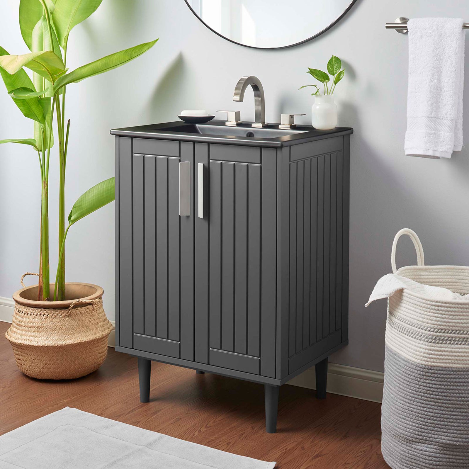 Sleek gray-black vanity elevates the bath with clean lines and a compact footprint || EEI-5800-GRY-BLK || front_angle_room