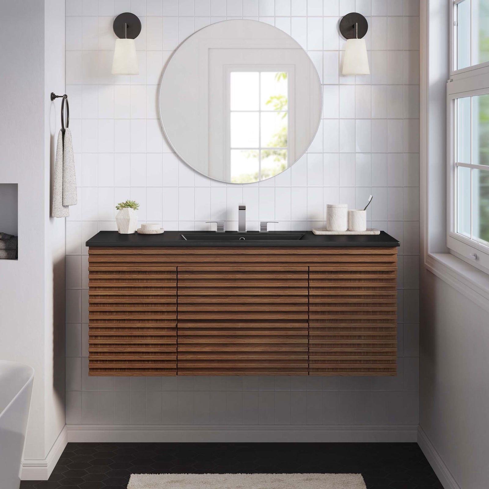 Floating walnut vanity with black integrated sink adds crisp contrast in a clean, modern bathroom. || EEI-5801-WAL-BLK || front_room