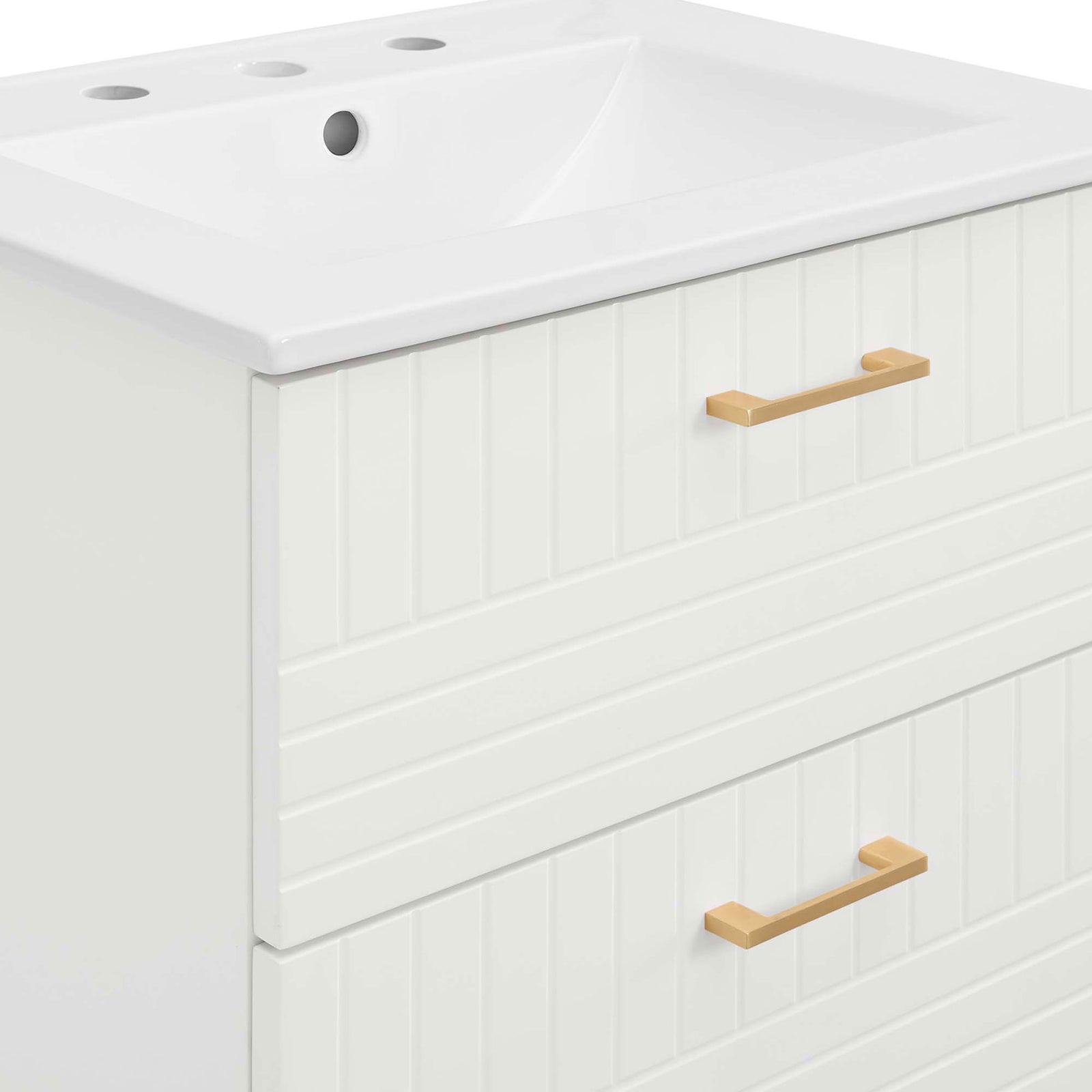 Textured panel fronts and satin-brushed gold handles add a refined touch to the white finish || EEI-5818-WHI-WHI || detail_studio