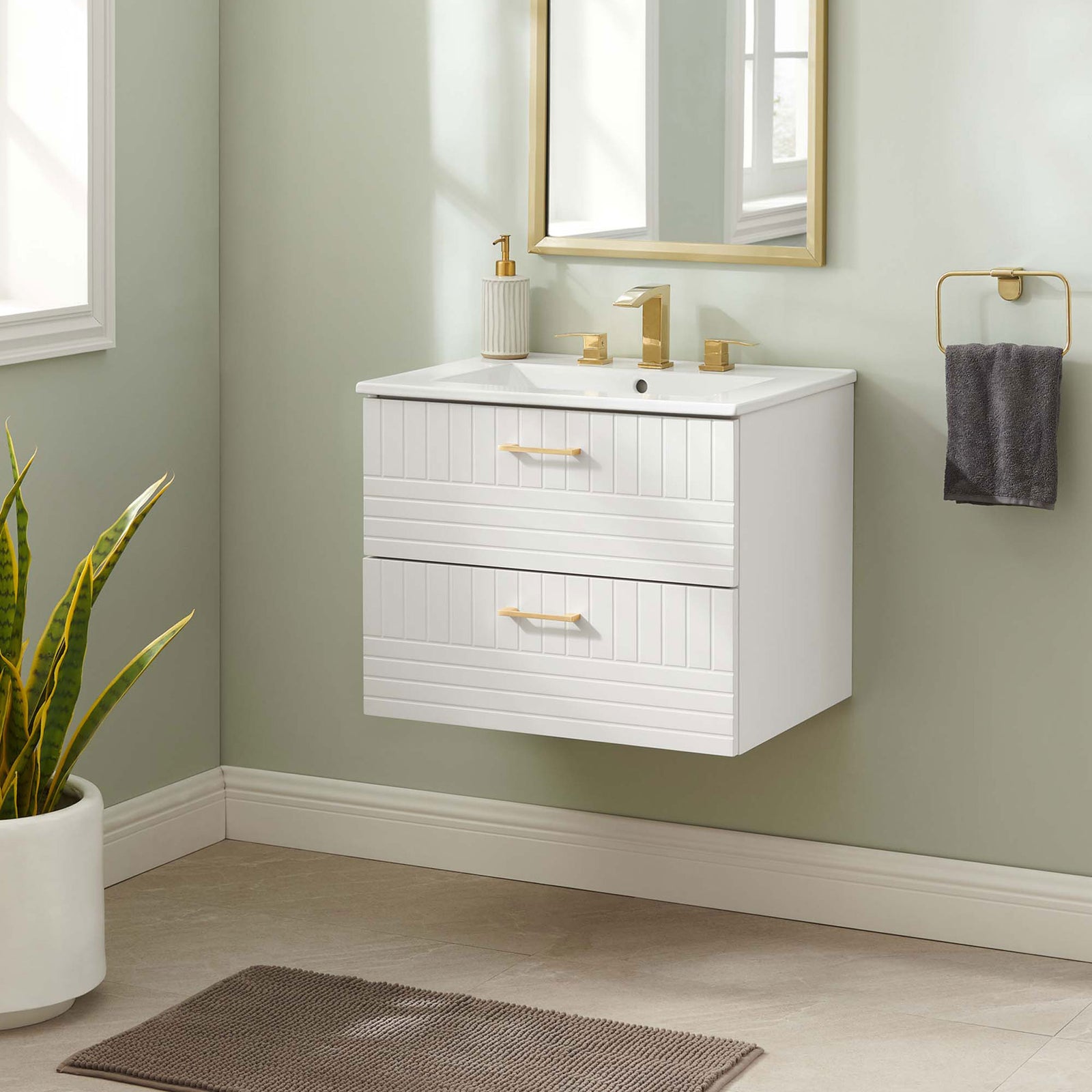 Wall-mounted vanity brings bright white style and gold accents to a fresh, airy bathroom || EEI-5818-WHI-WHI || front_angle_room