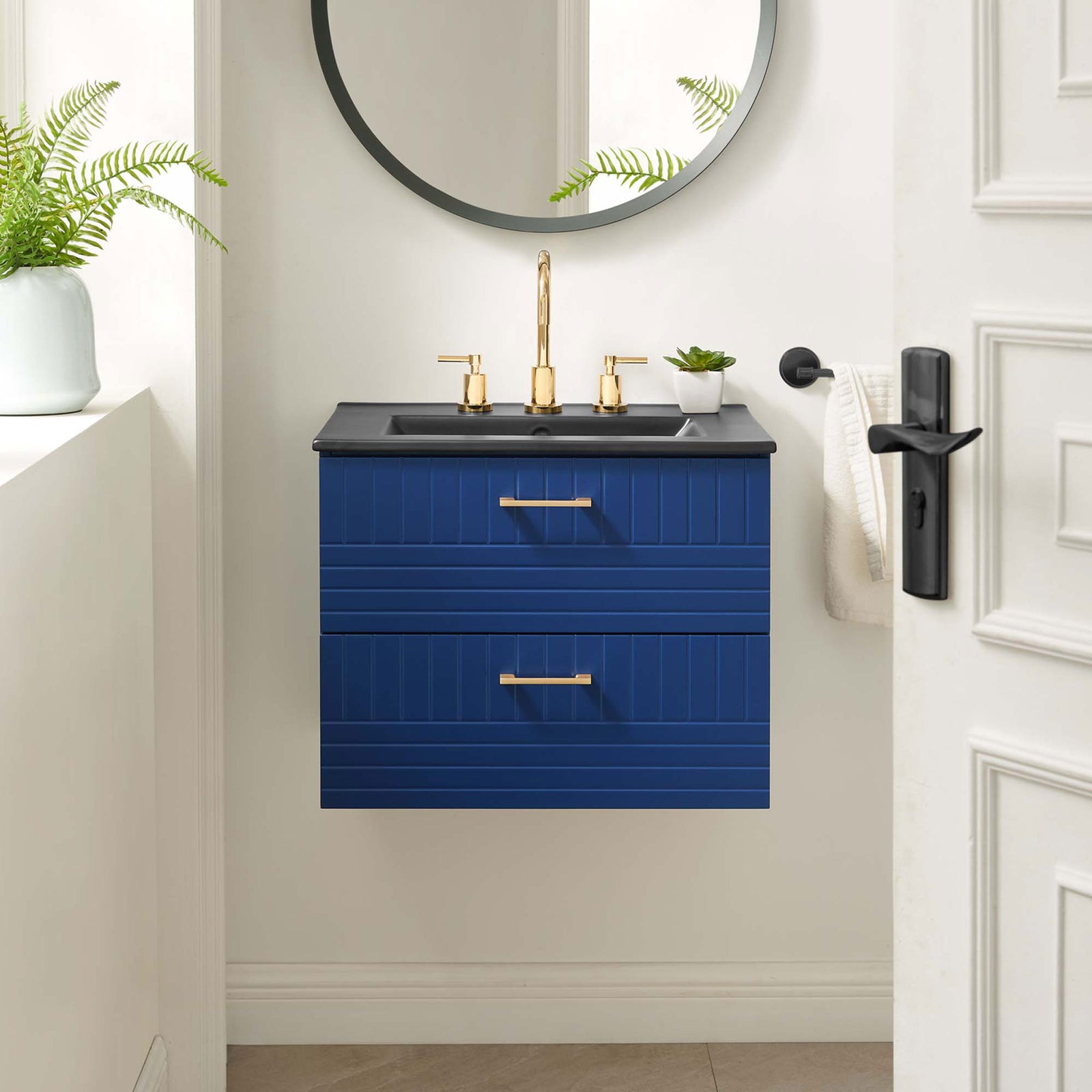 Striking blue vanity anchors the bath with clean lines and an elegant matte black sink. || EEI-5820-BLU-BLK || front_room