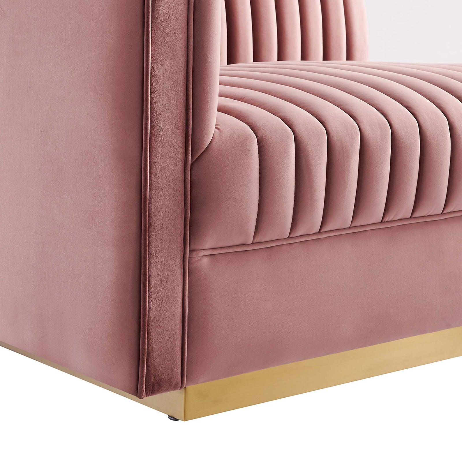 Plush dusty rose velvet upholstery with deep vertical channel tufting above a brushed gold base || EEI-5824-DUS || detail_studio
