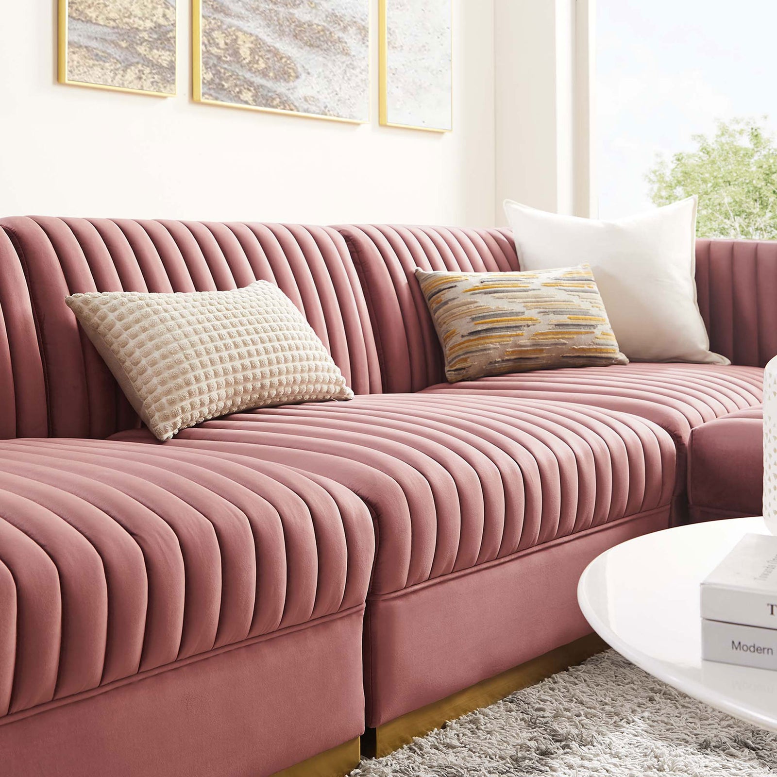 Cozy living room with dusty rose velvet sectional dressed in layered accent pillows. || EEI-5826-DUS || detail_room