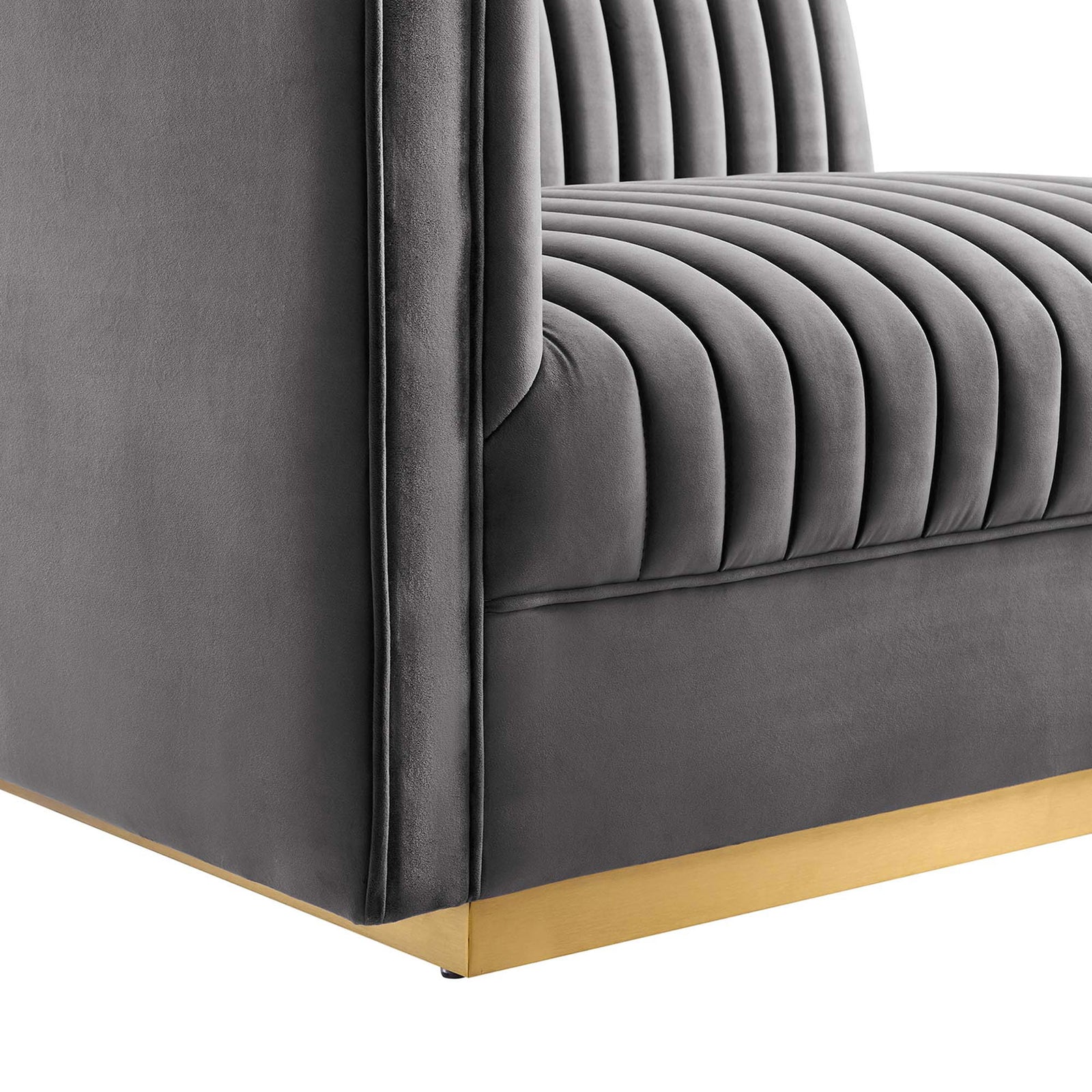 Gray performance velvet upholstery with vertical channel tufting above a brushed gold metal base corner || EEI-5827-GRY || detail_studio